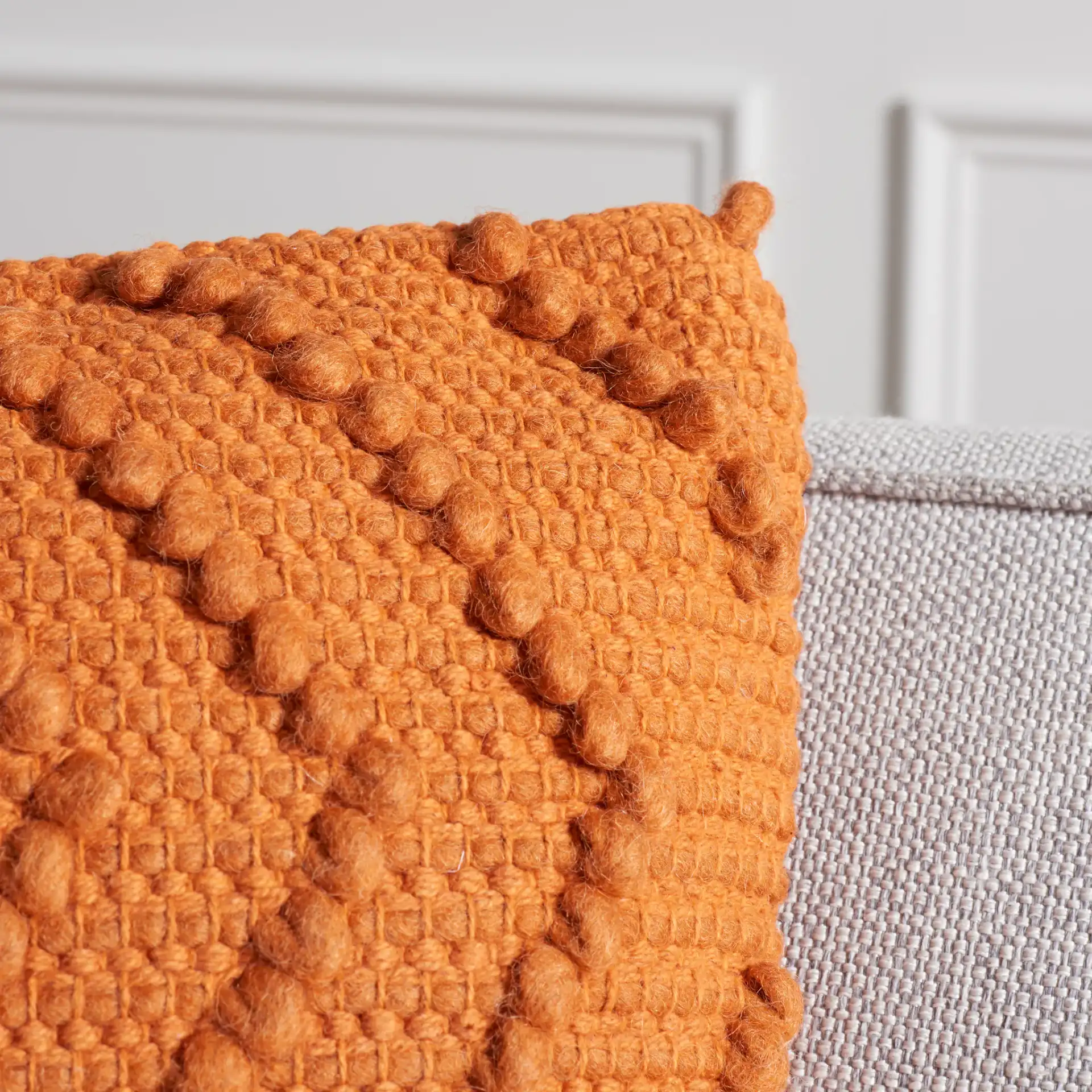 Adalia Pillow in Gray in a styled room