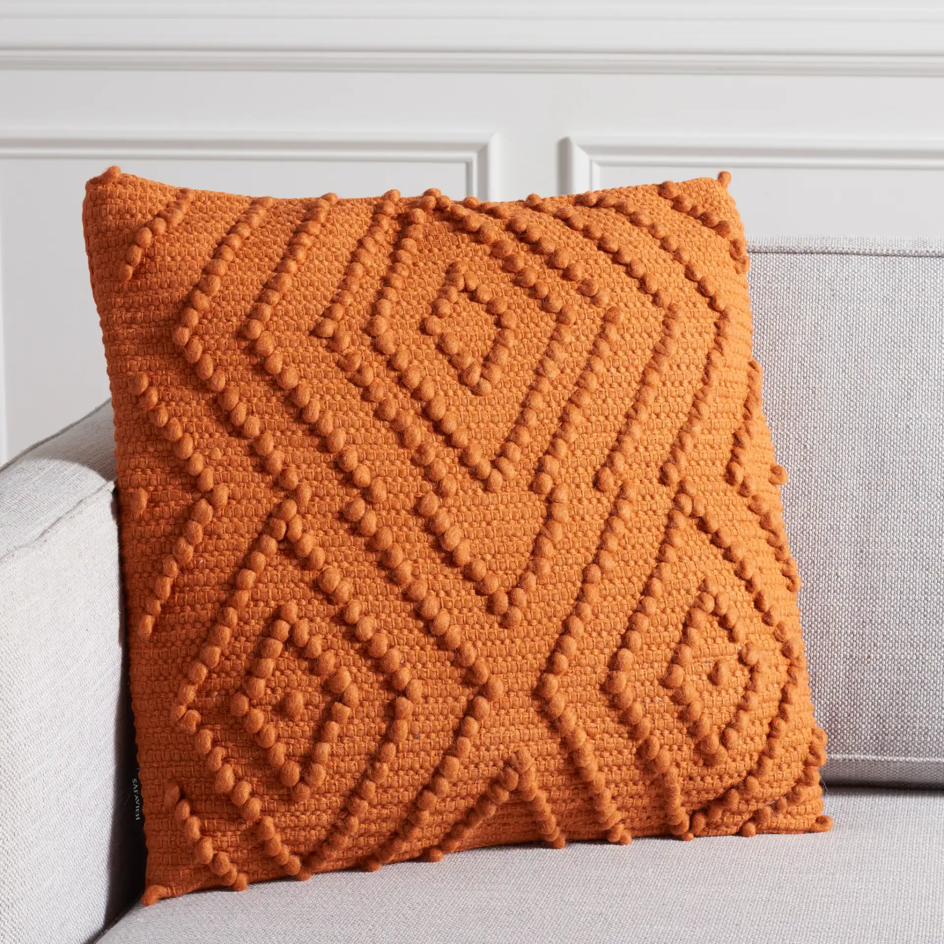 Adalia Pillow in Gray in a styled room
