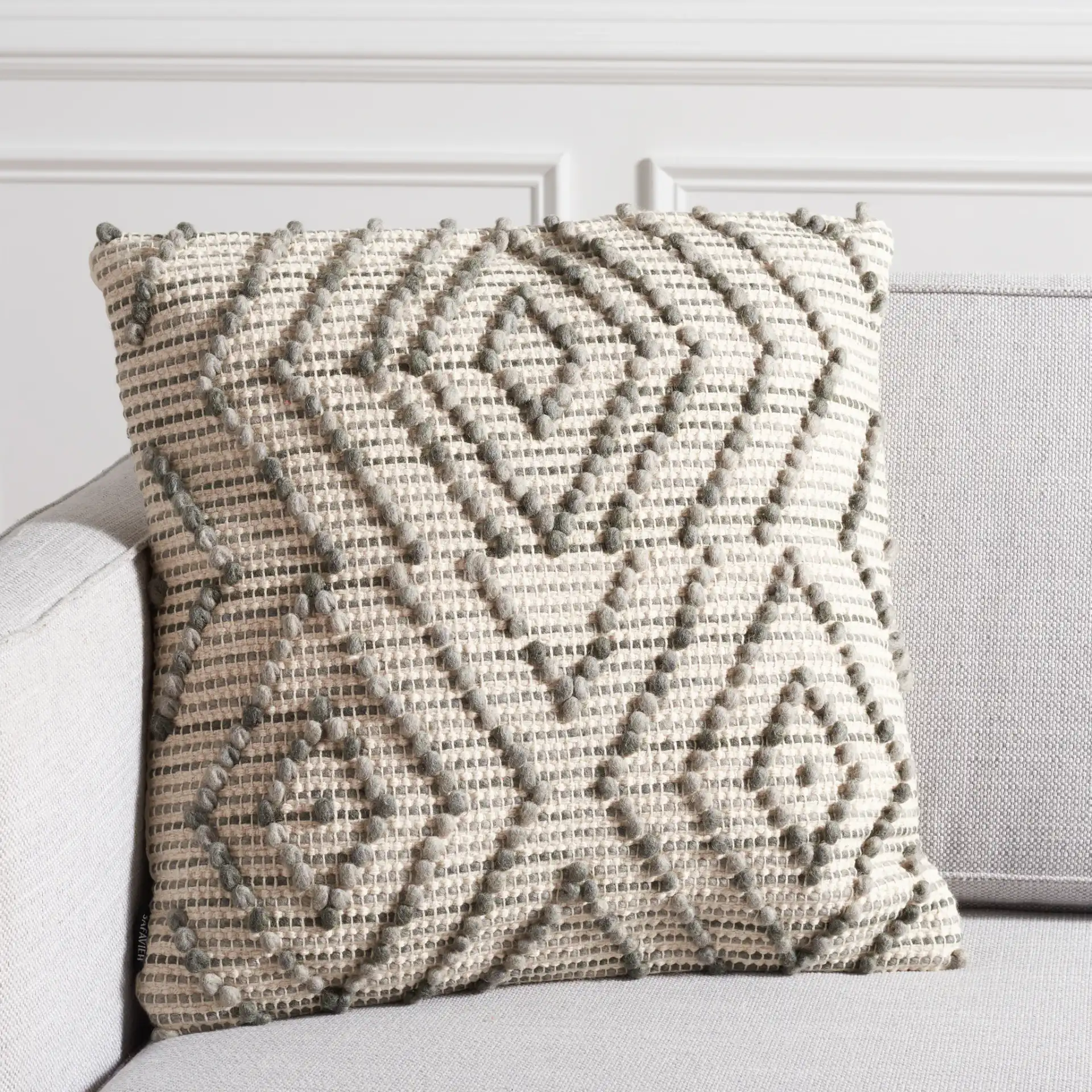 Adalia Pillow in Gray in a styled room