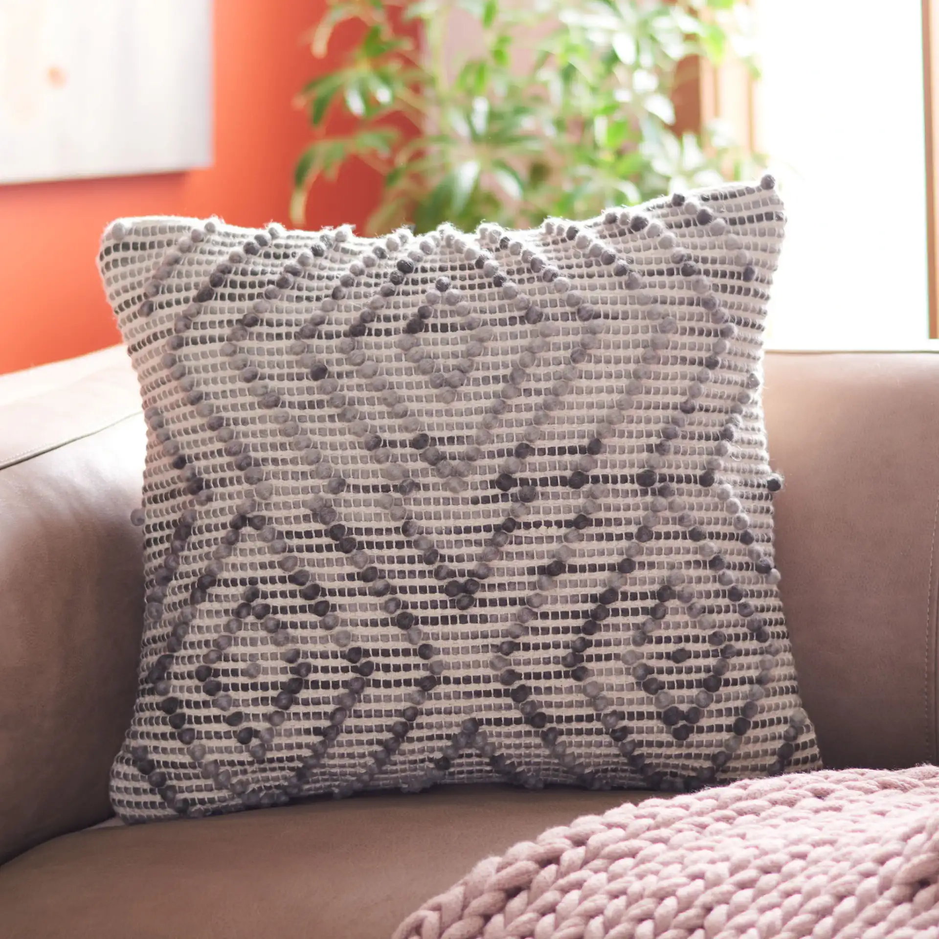 Adalia Pillow in Gray in a styled room