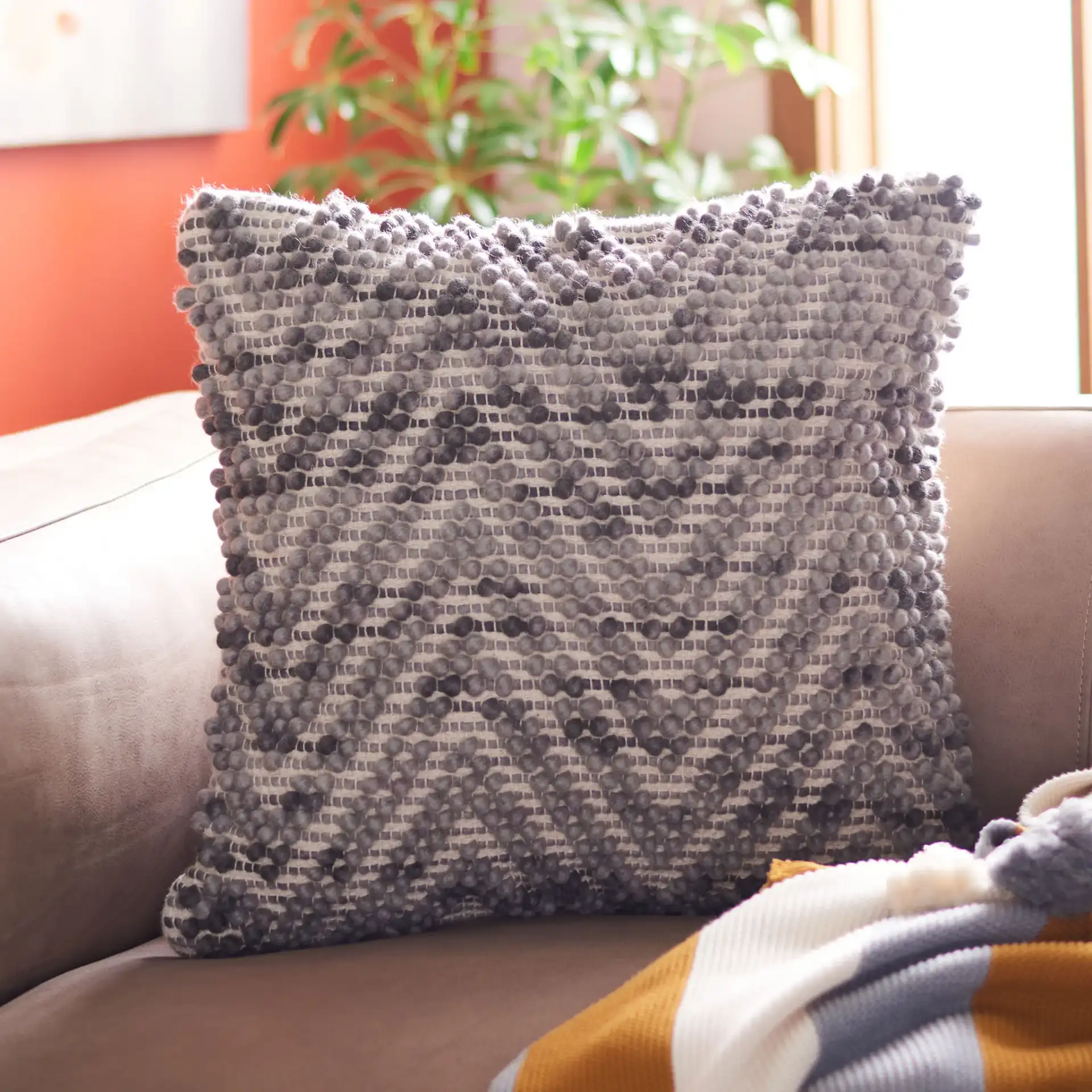 Eydie Pillow in Gray in a styled room