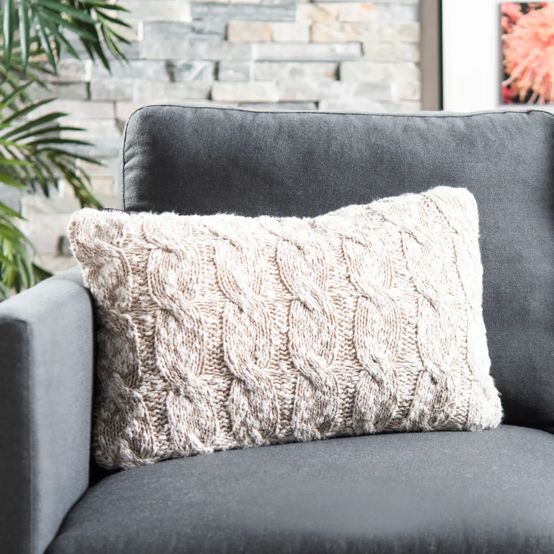 Chunky Knit Pillow in Stone / Natural in a styled room