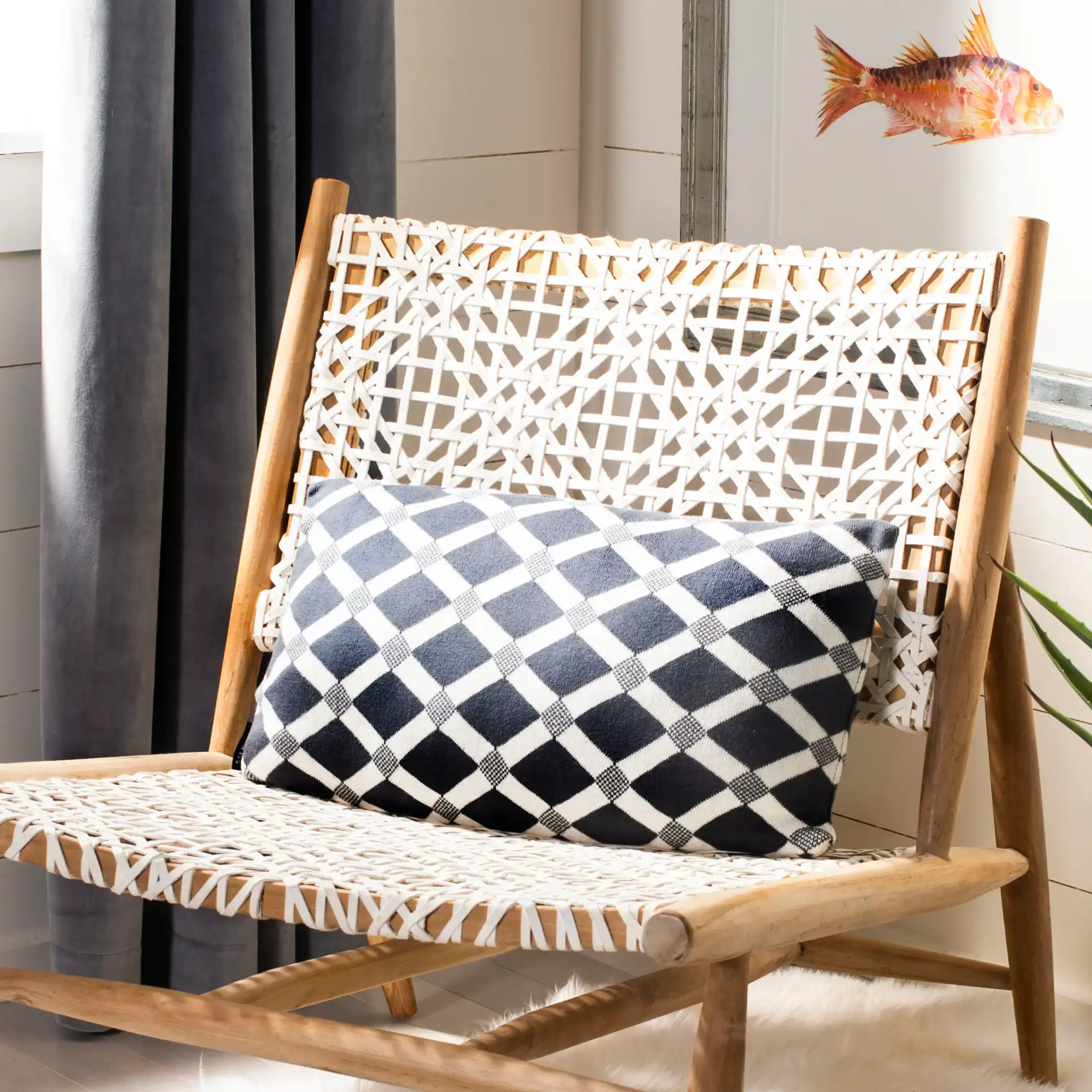 Diamond Knit Pillow in Dark Gray / Natural in a styled room
