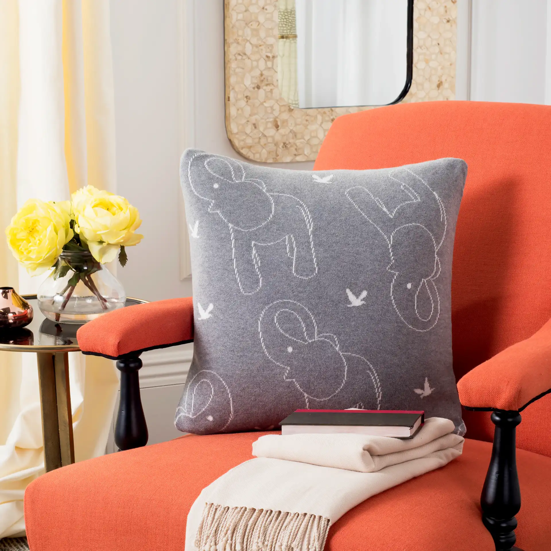 Ella Knit Pillow in Light Gray / Ivory in a styled room