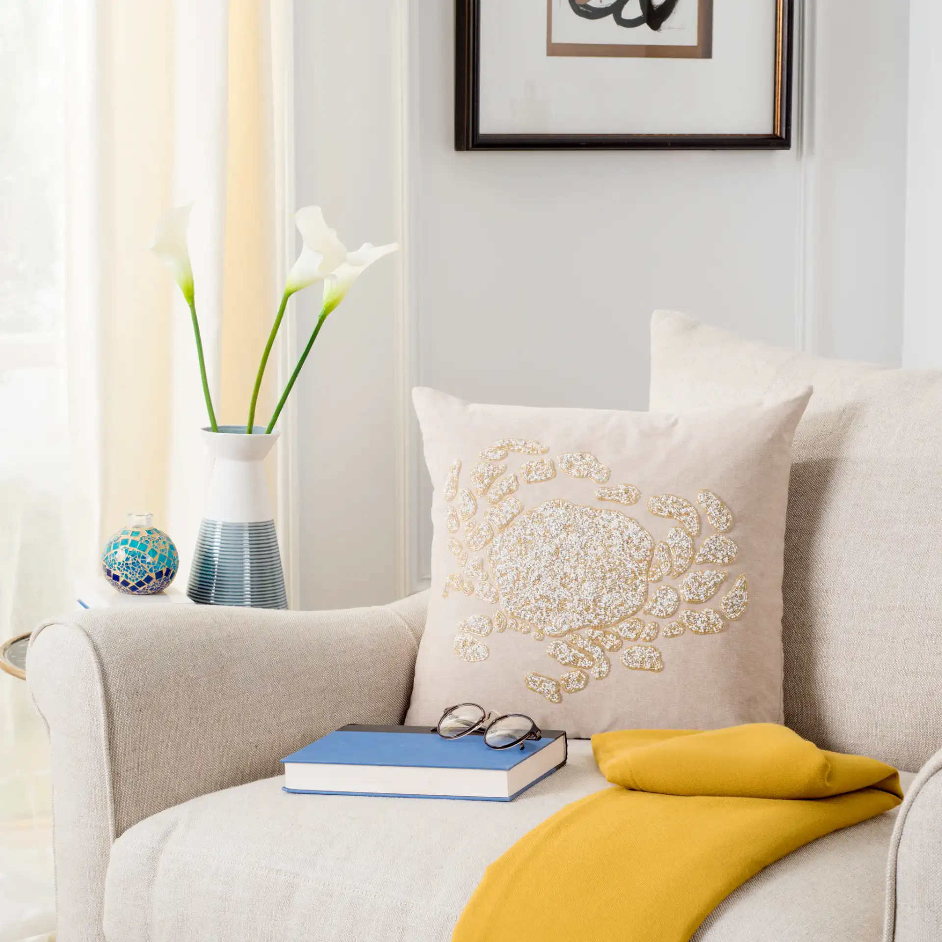 Pendi Pillow in Beige / White in a styled room