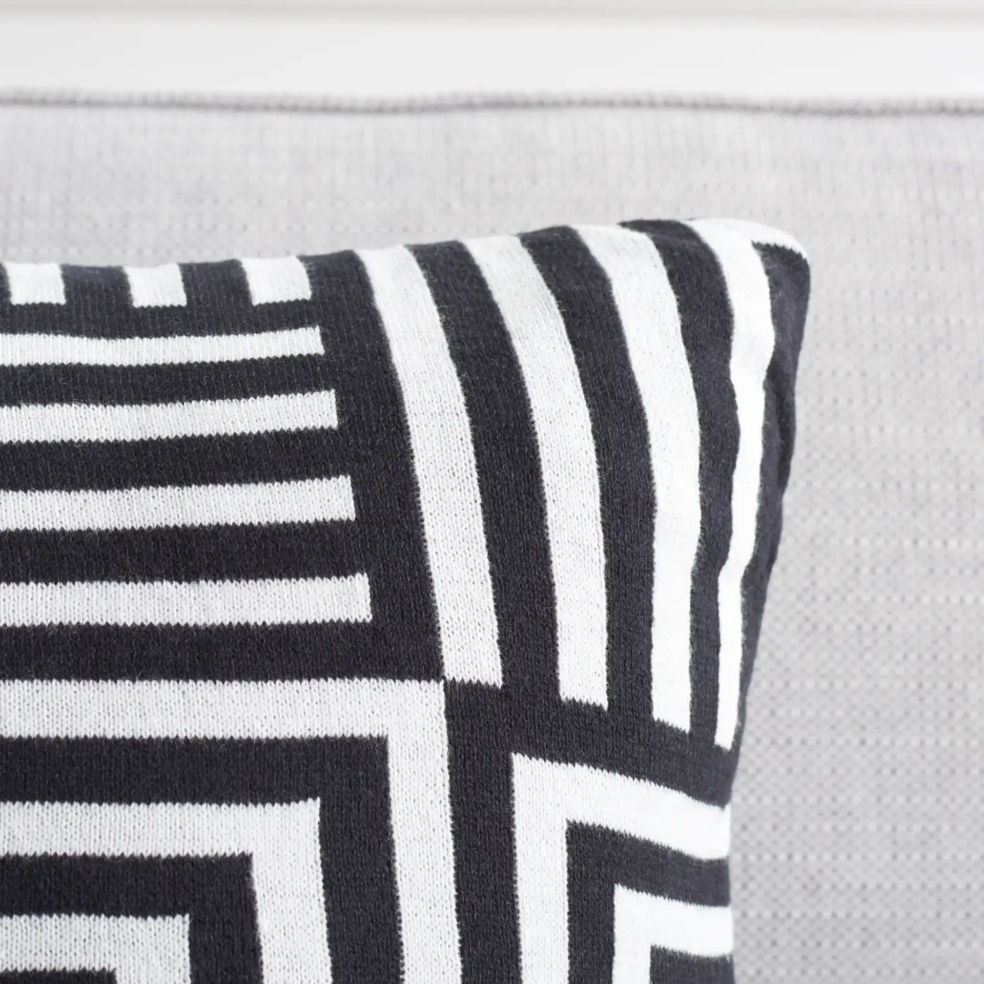 Ziggy Pillow (Set Of 2) in Black / Ivory in a styled room