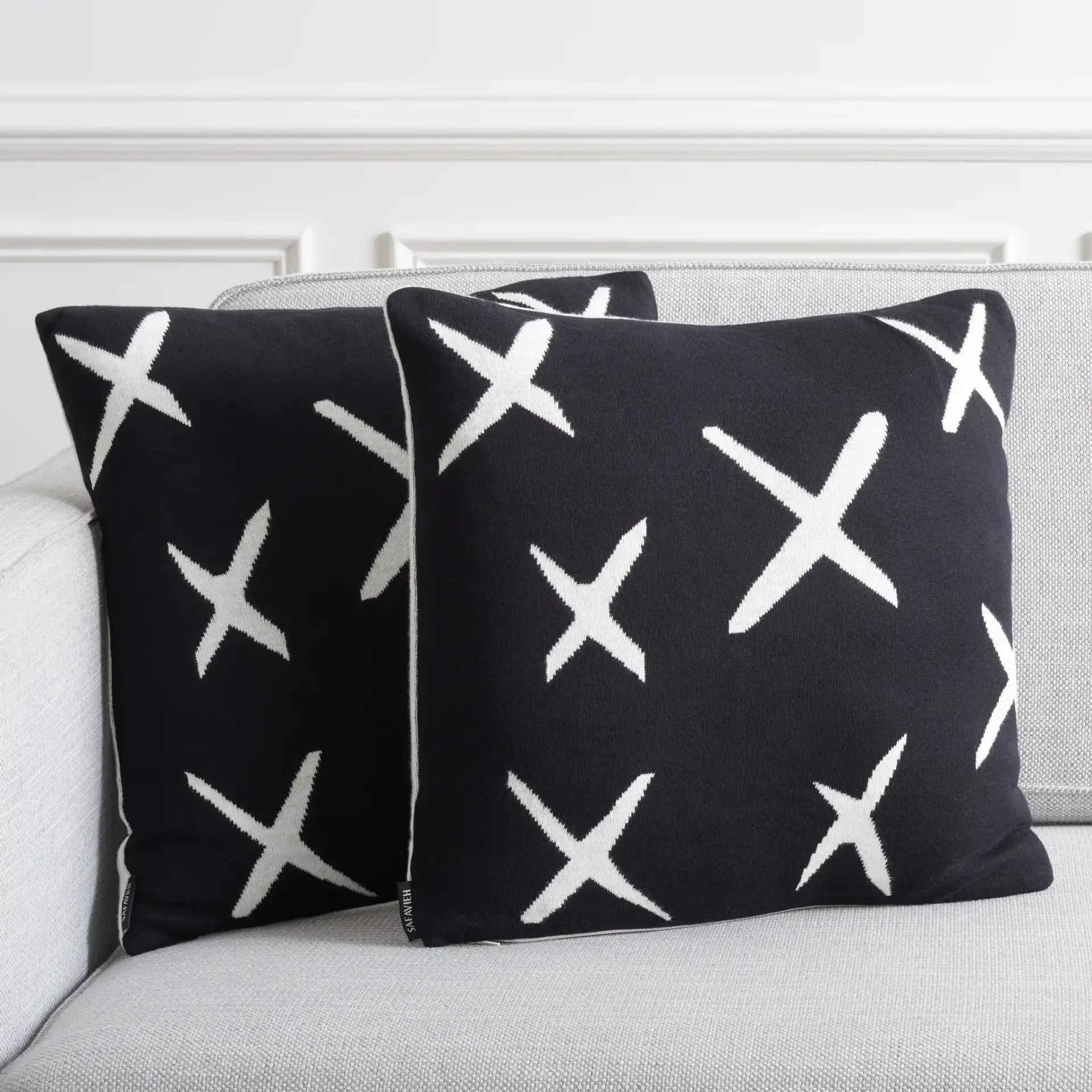Cantil Pillow (Set Of 2) in Black / Ivory in a styled room