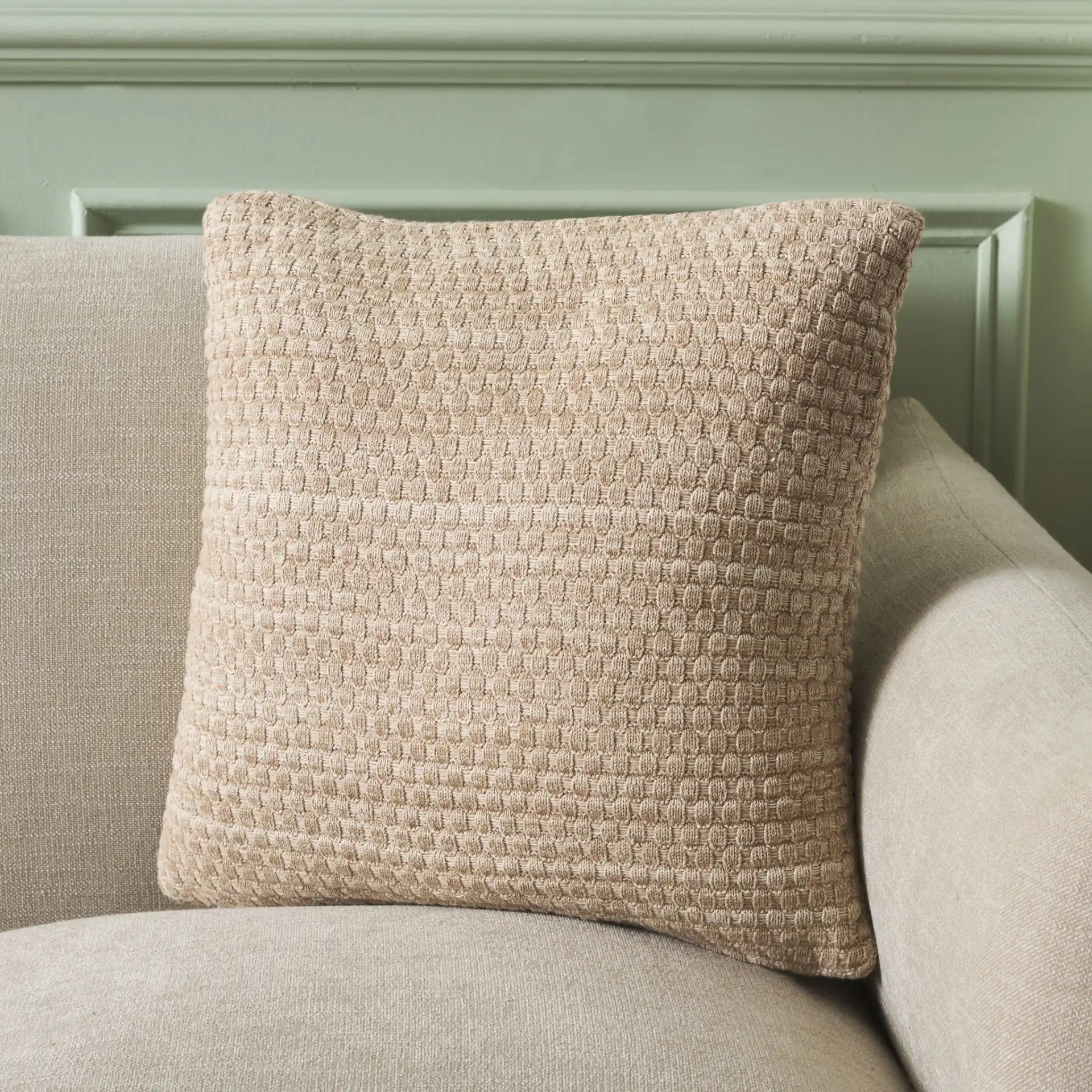 Rava Pillow in Natural / Beige in a styled room