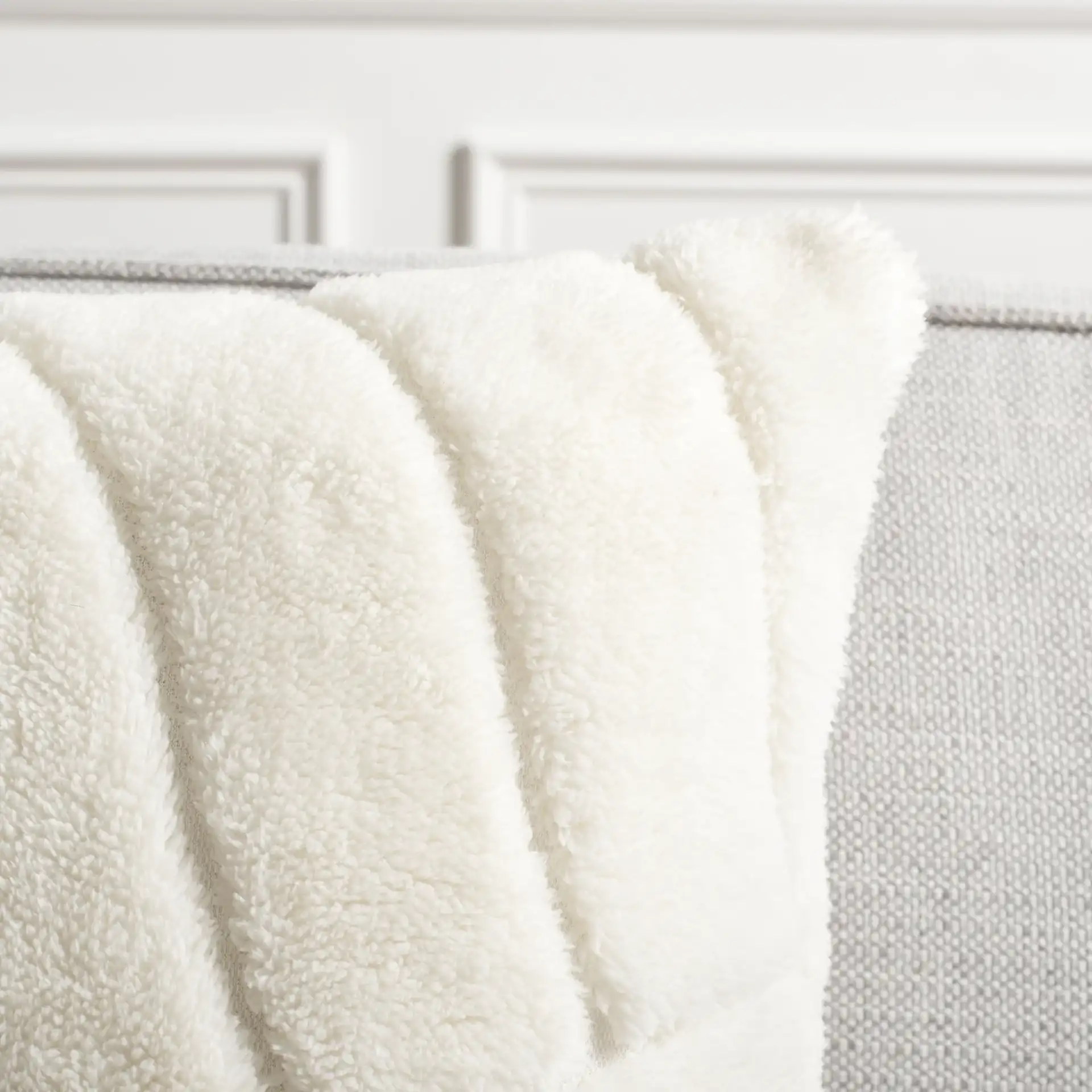 Verli Pillow in Ivory in a styled room