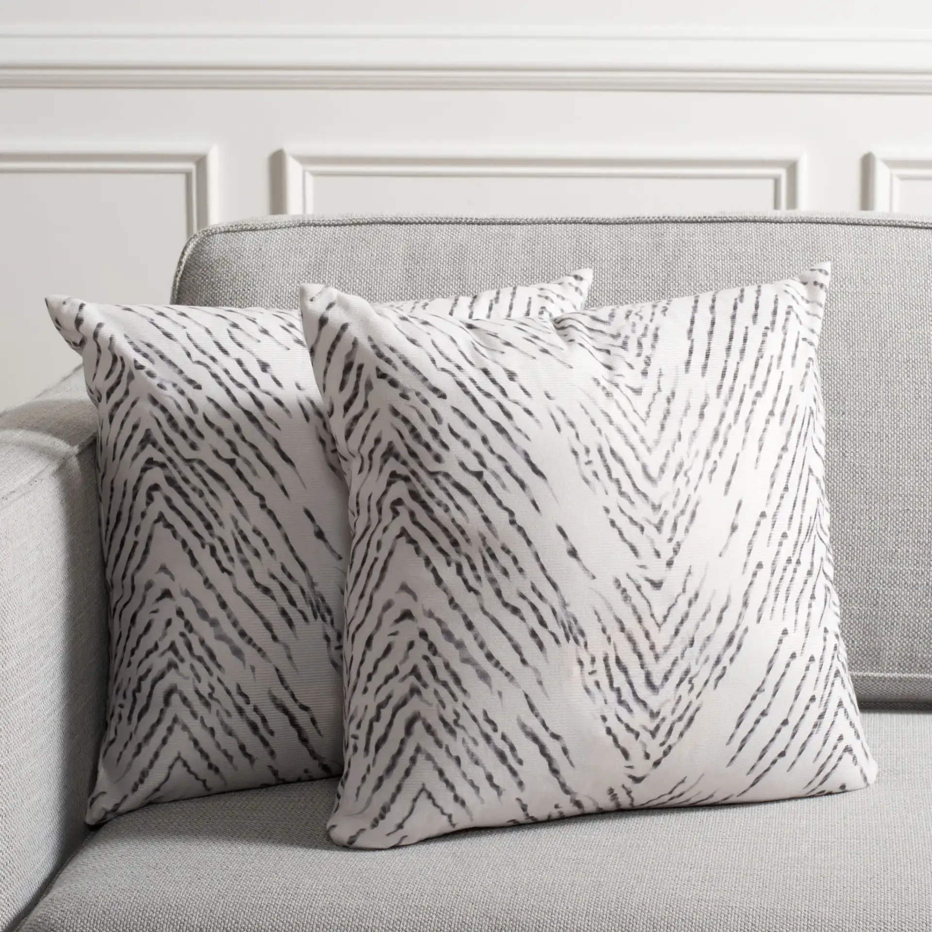 Zecora Pillow in Ivory / Black in a styled room