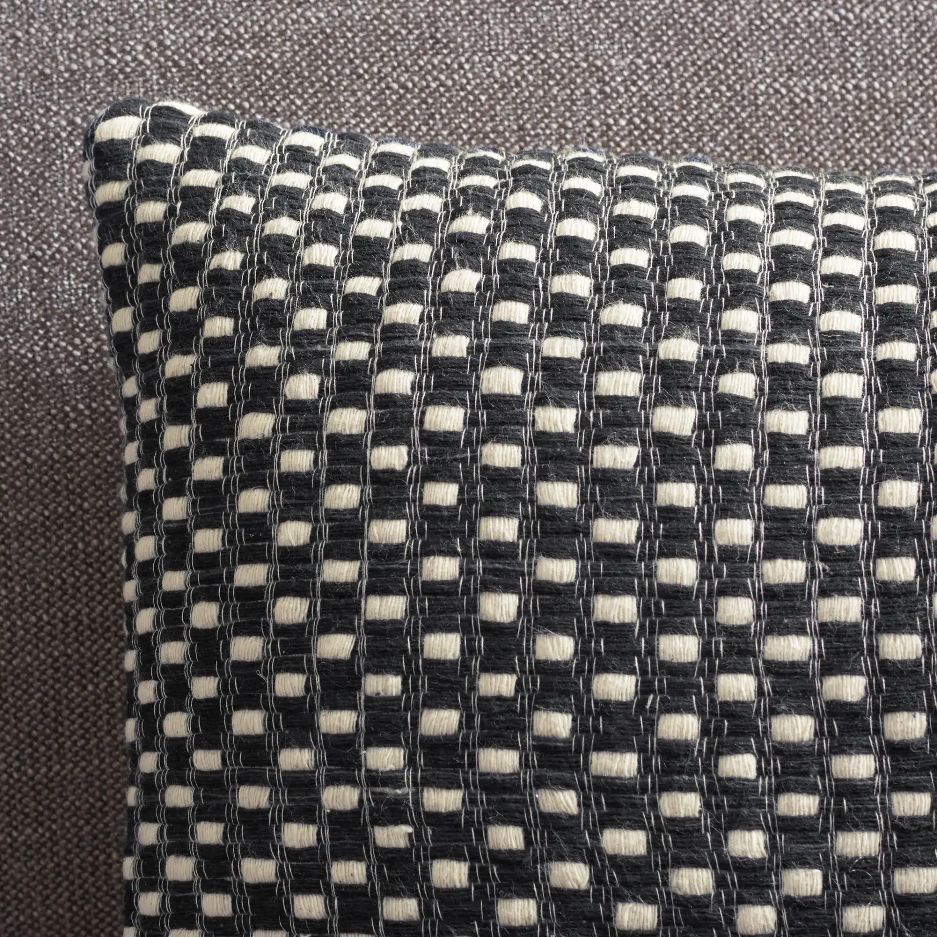 Millie Pillow in Black / Cream in a styled room