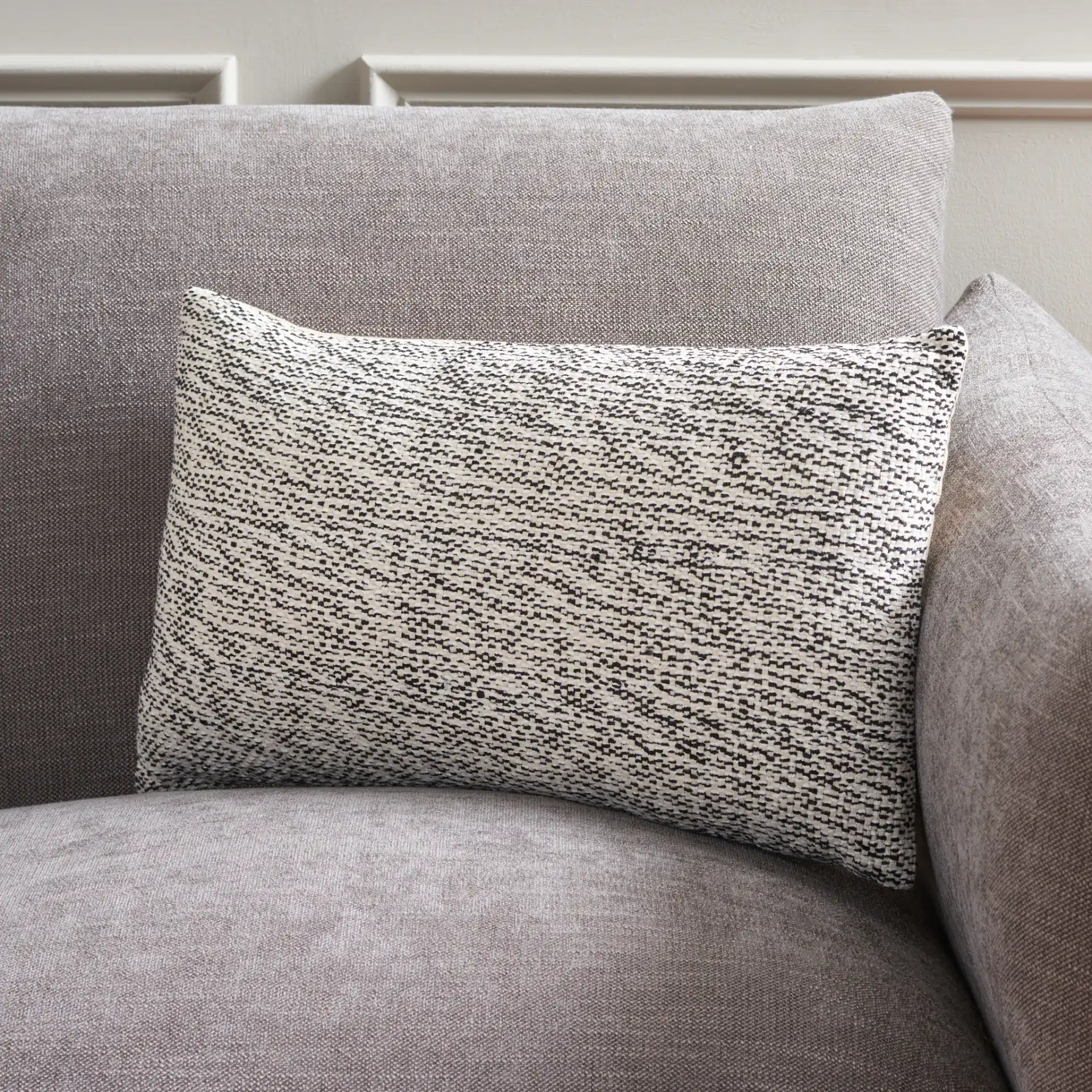 Kola Pillow in Black / White in a styled room