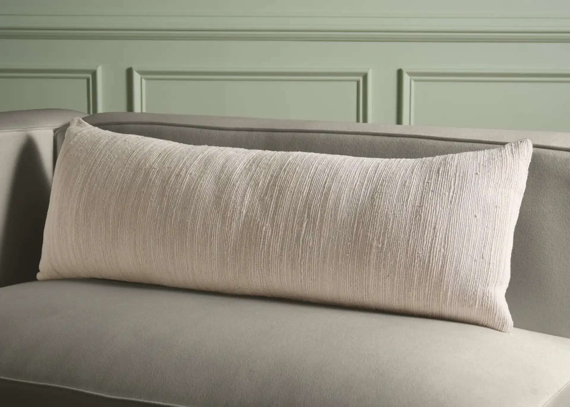 Ameya Pillow in Ivory / Natural in a styled room