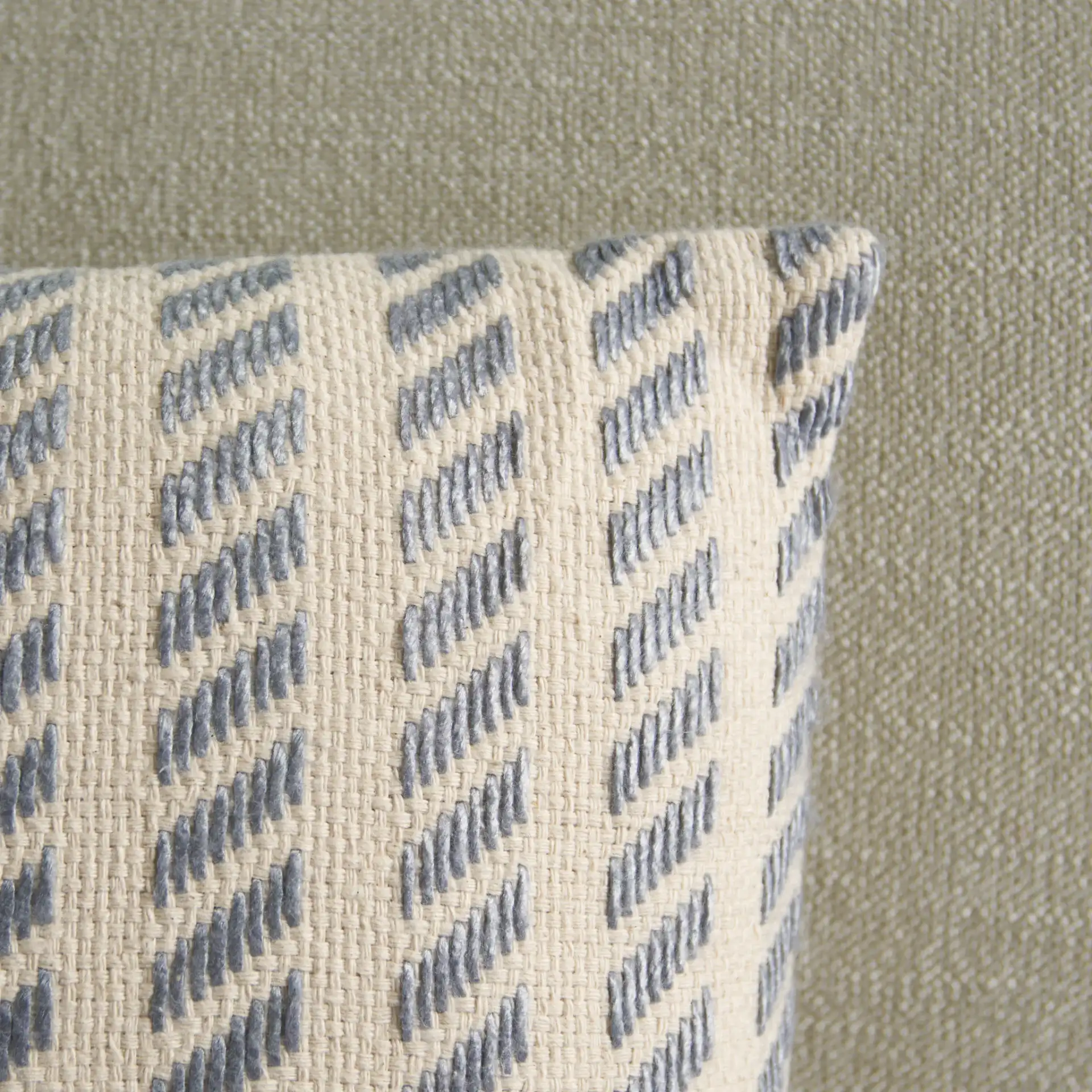 Suki Pillow in Natural / Gray in a styled room