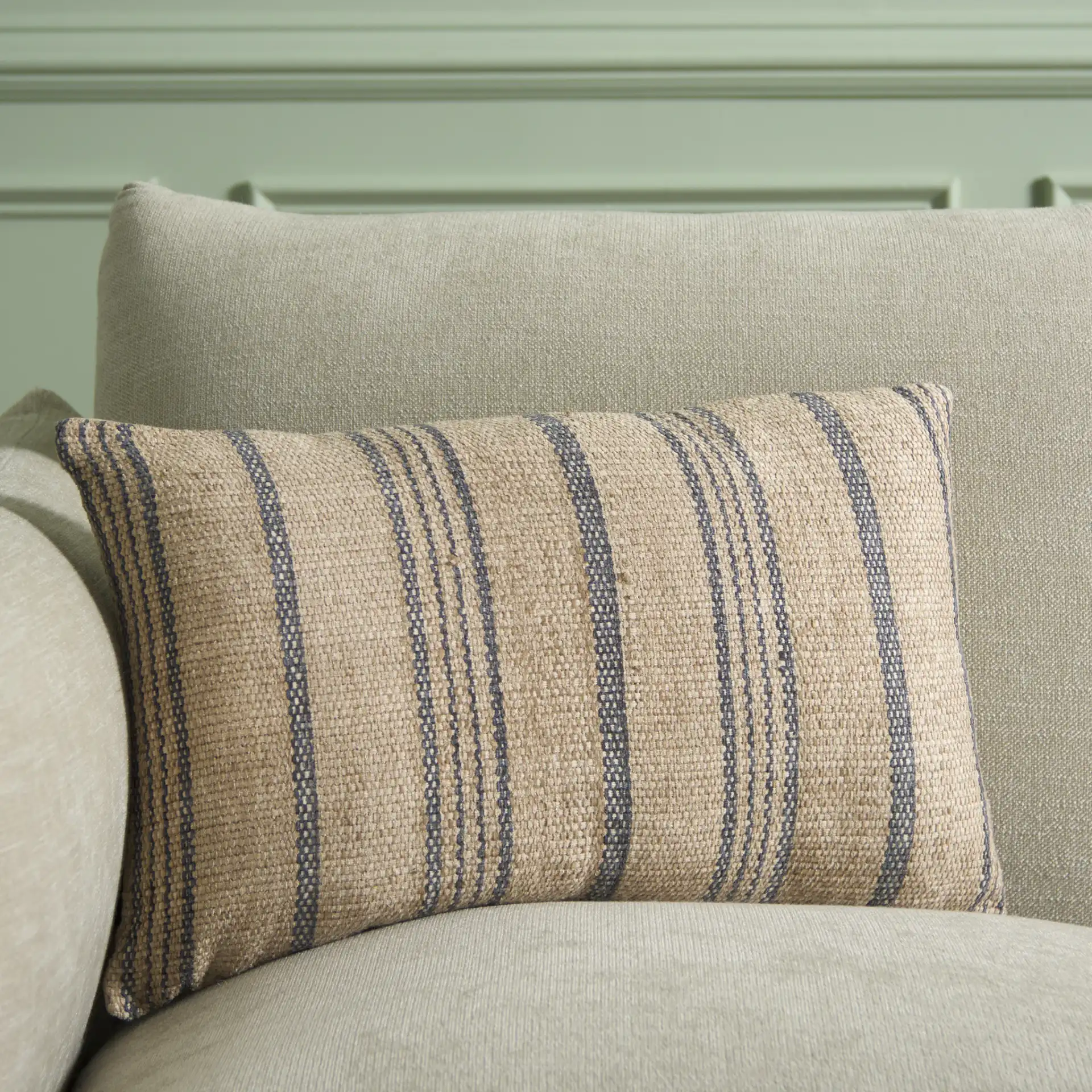 Junie Pillow in Natural / Gray in a styled room