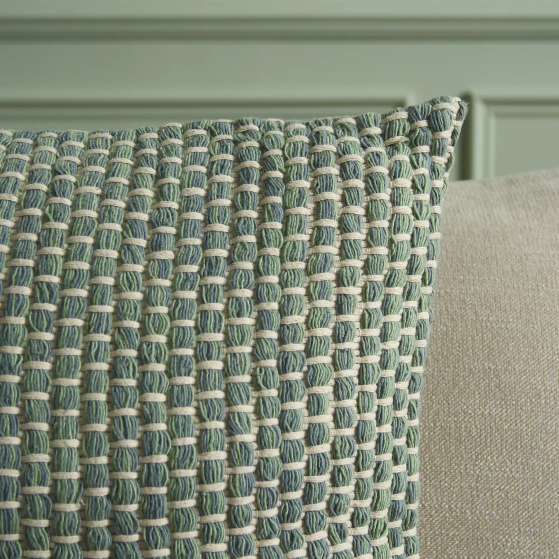 Ina Pillow in Green in a styled room
