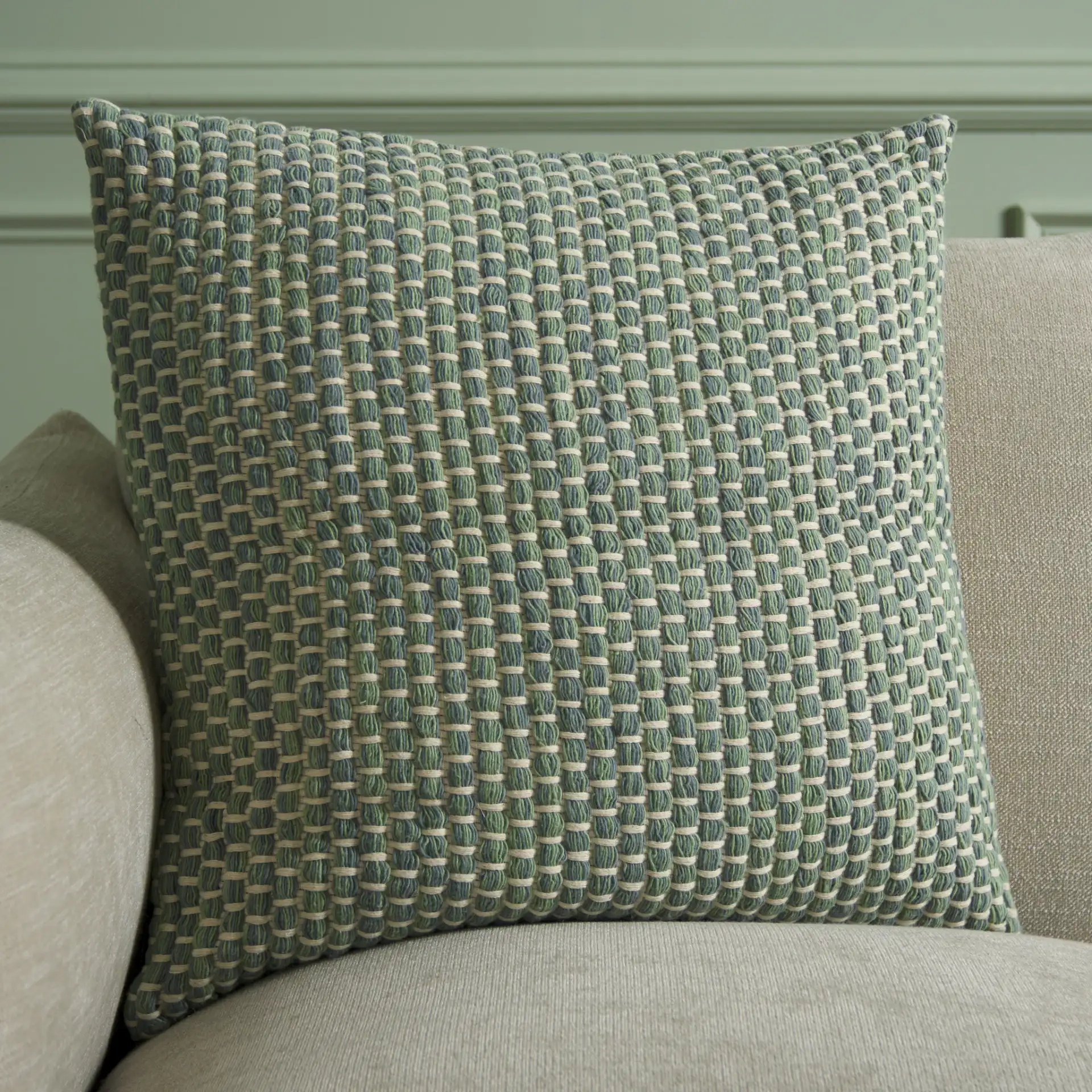 Ina Pillow in Green in a styled room