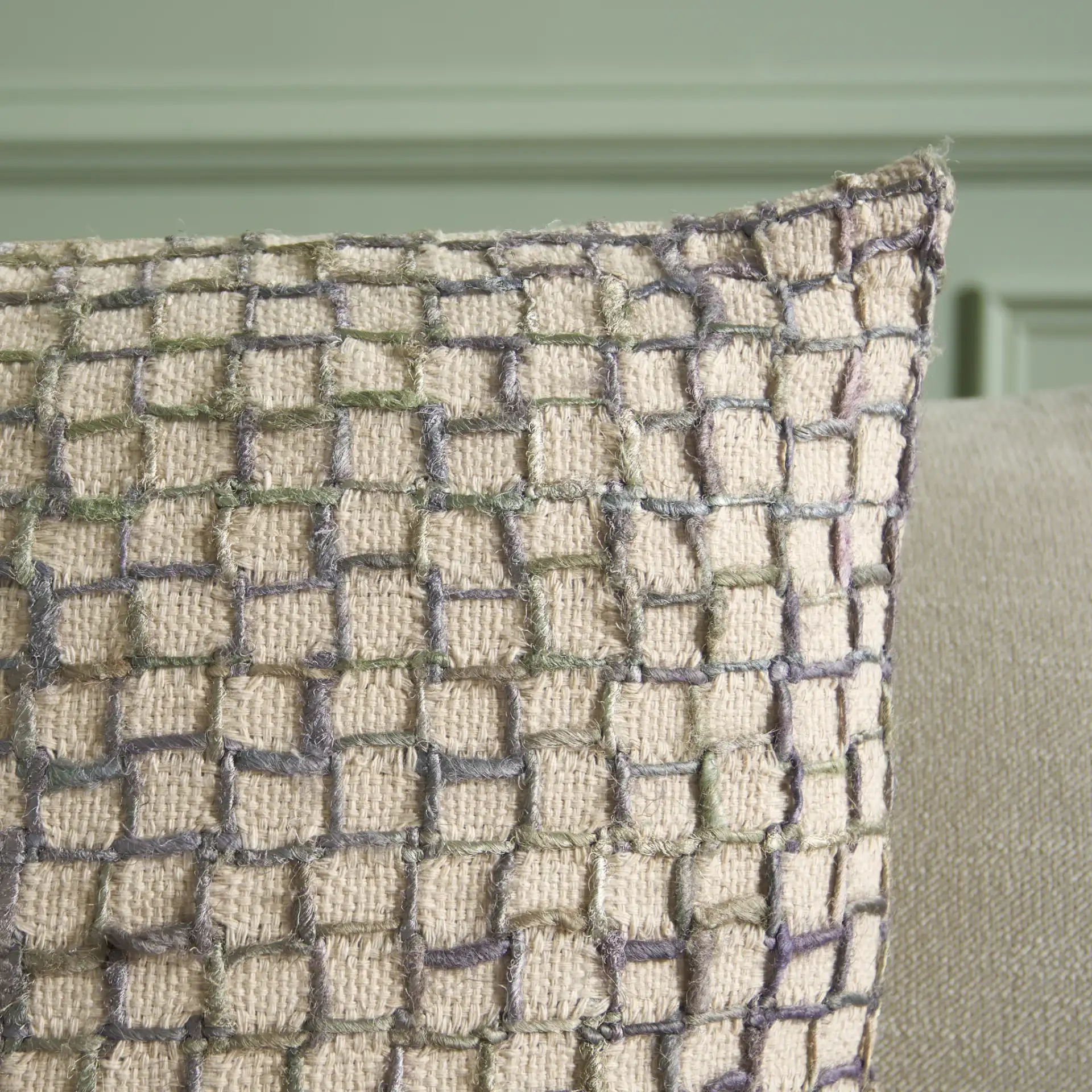 Quella Pillow in Gray in a styled room
