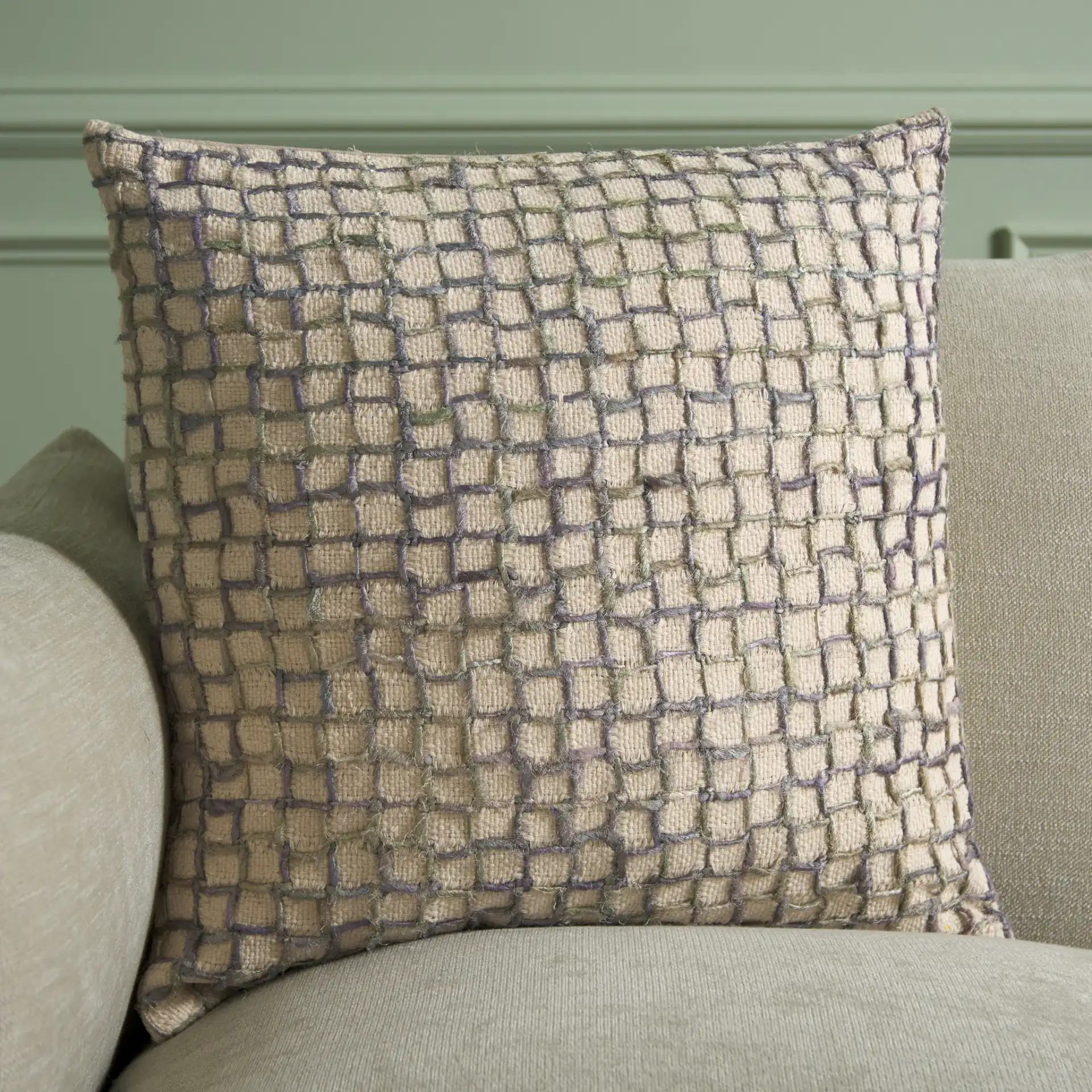 Quella Pillow in Gray in a styled room