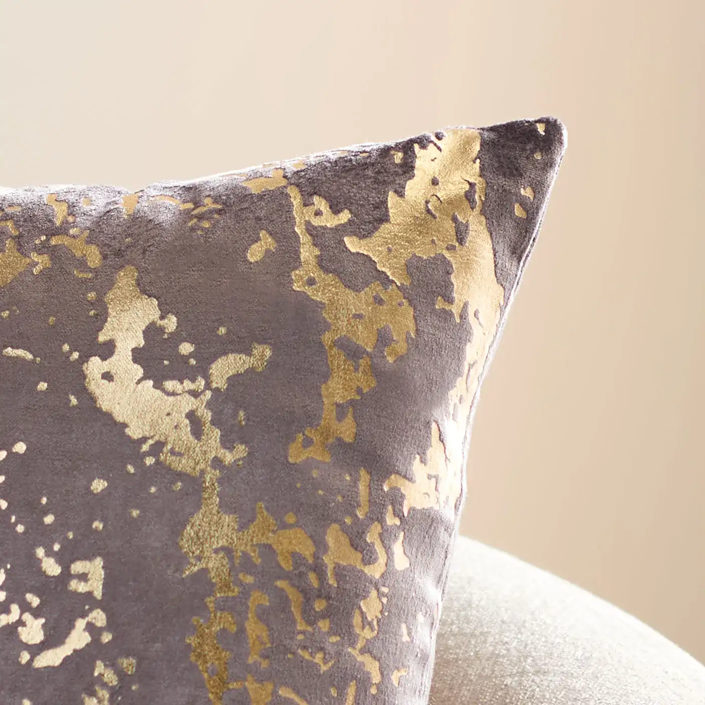 Pari Pillow in Brown / Gold Foil in a styled room
