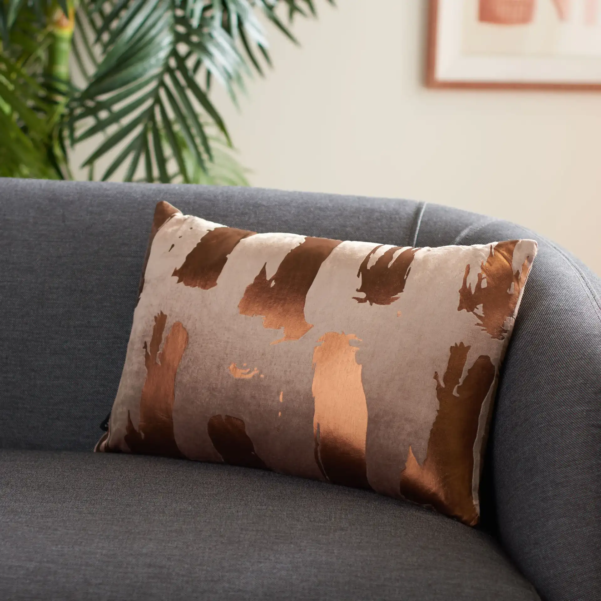Hannia Pillow in Brown in a styled room