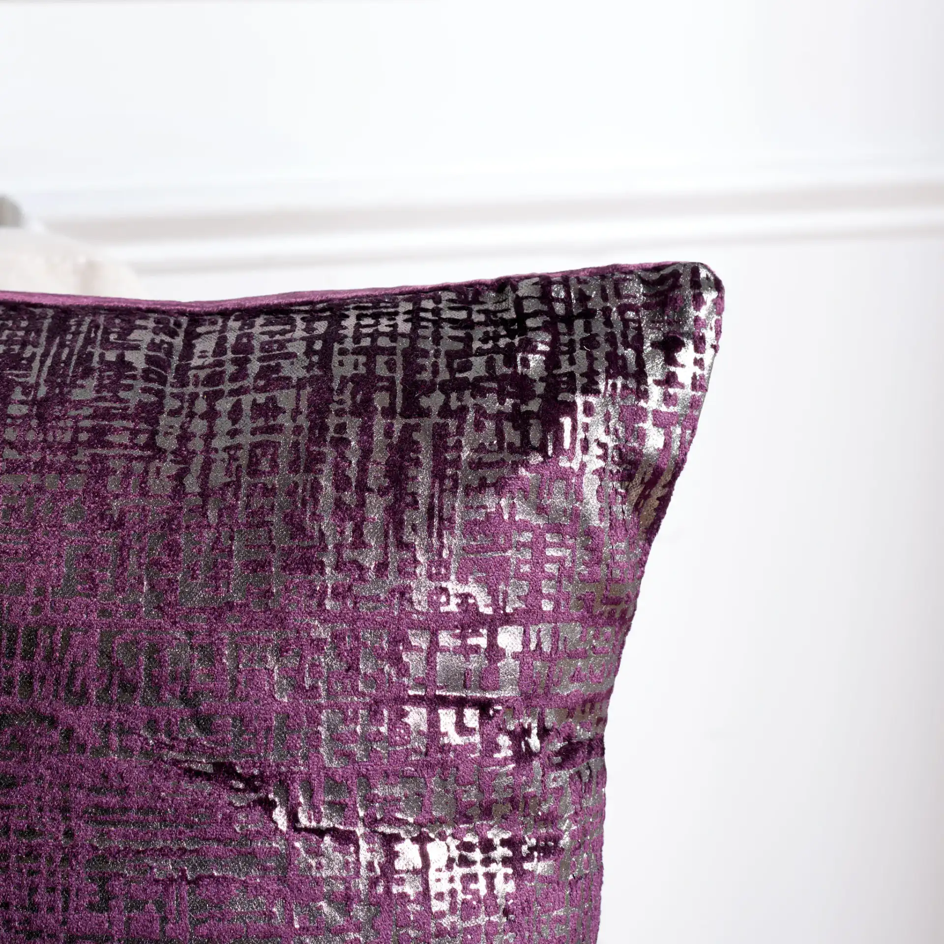 Prenlia Pillow in Purple / Silver in a styled room