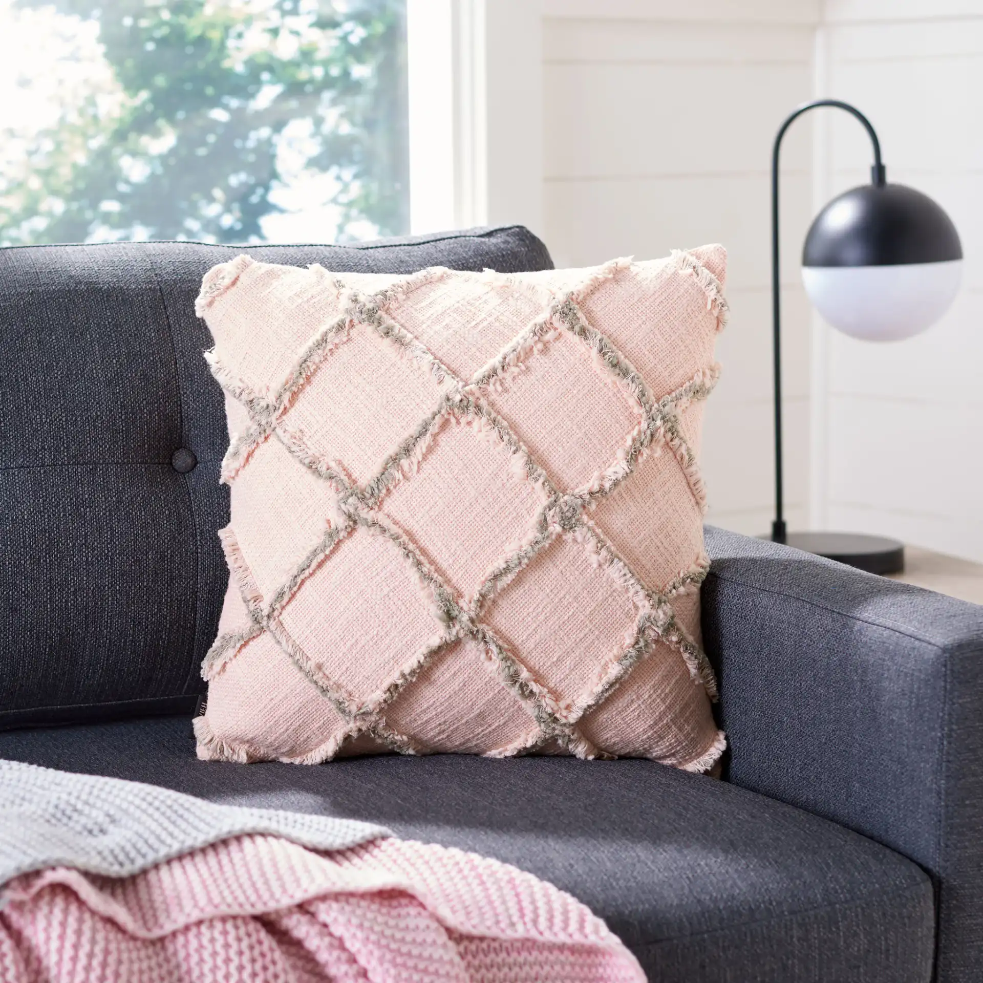 Ashlin Pillow in Beige / Gray in a styled room