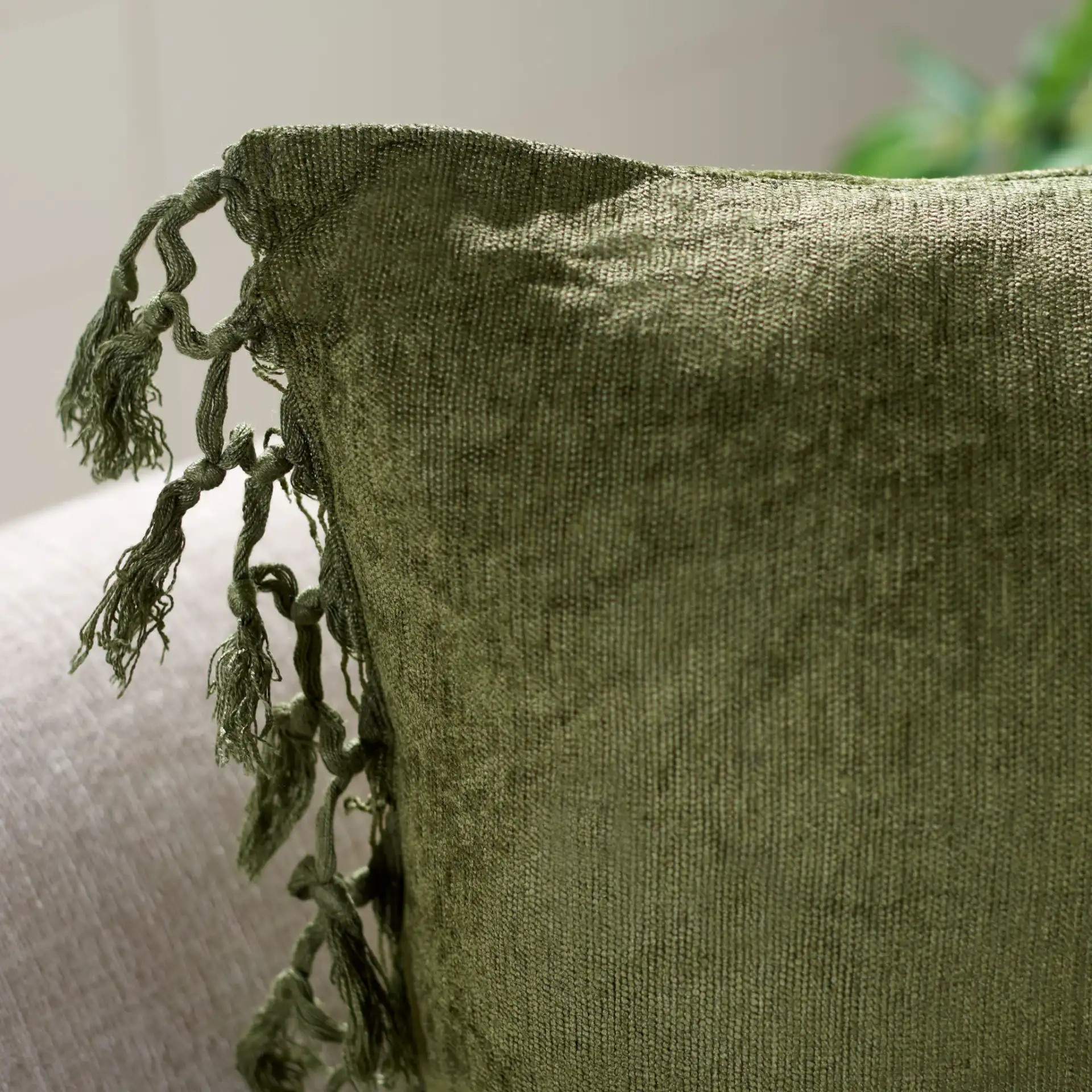 Dandria Pillow in Dark Green in a styled room