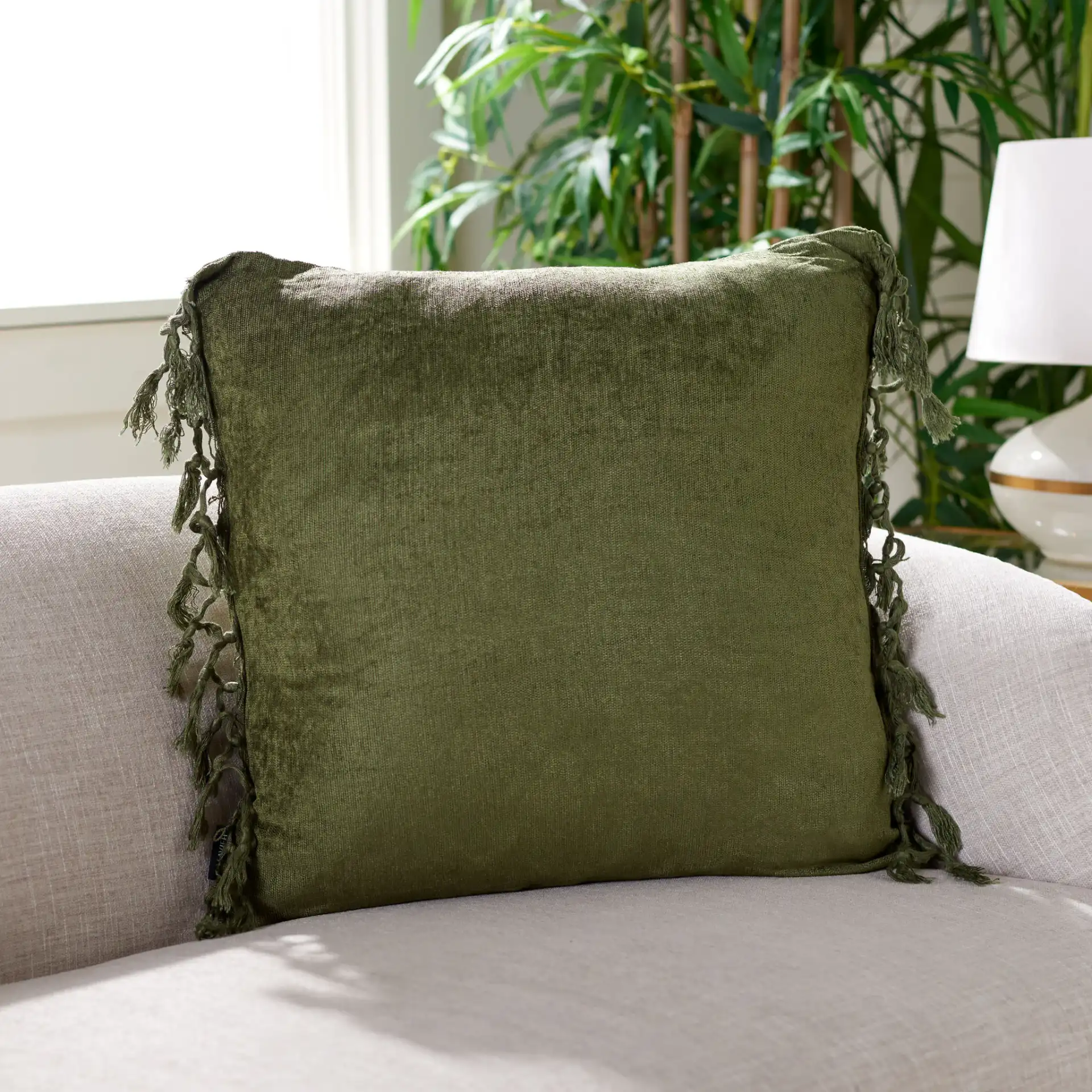 Dandria Pillow in Dark Green in a styled room
