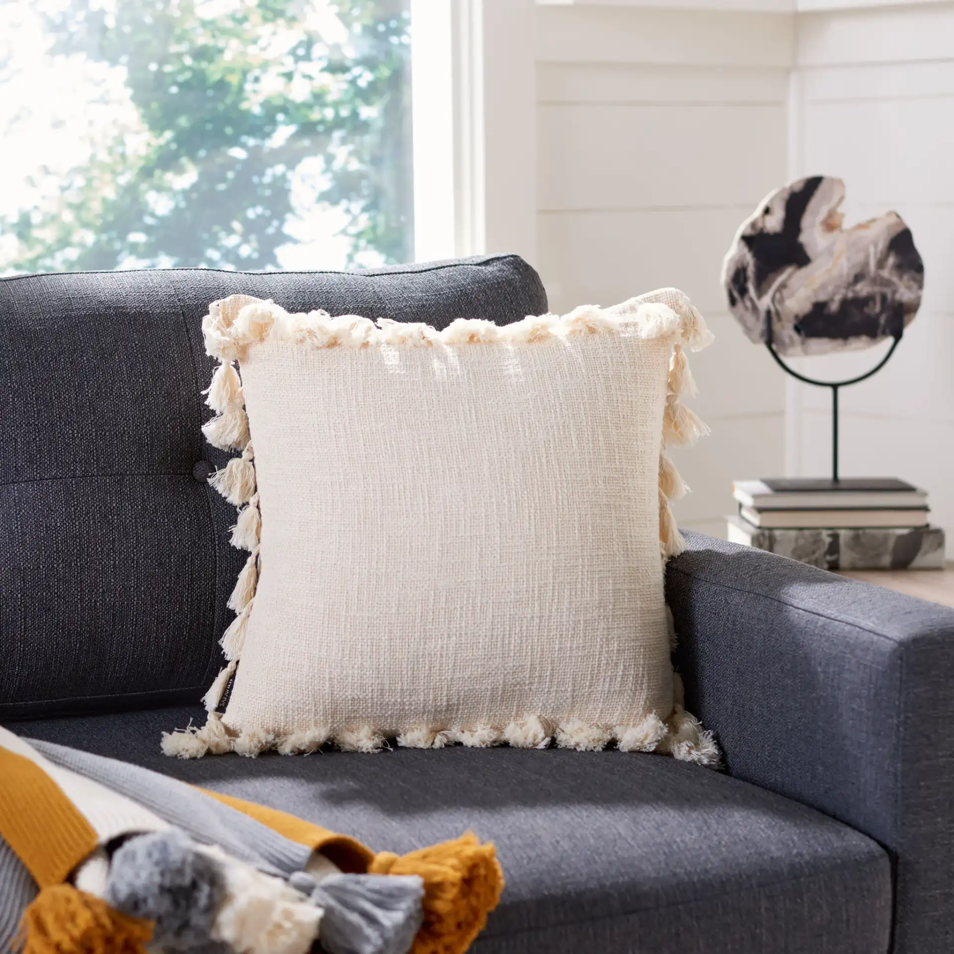 Skyla Pillow in Beige in a styled room