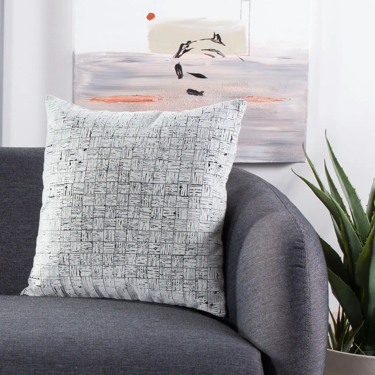 Halina Throw Pillow in Black / White in a styled room