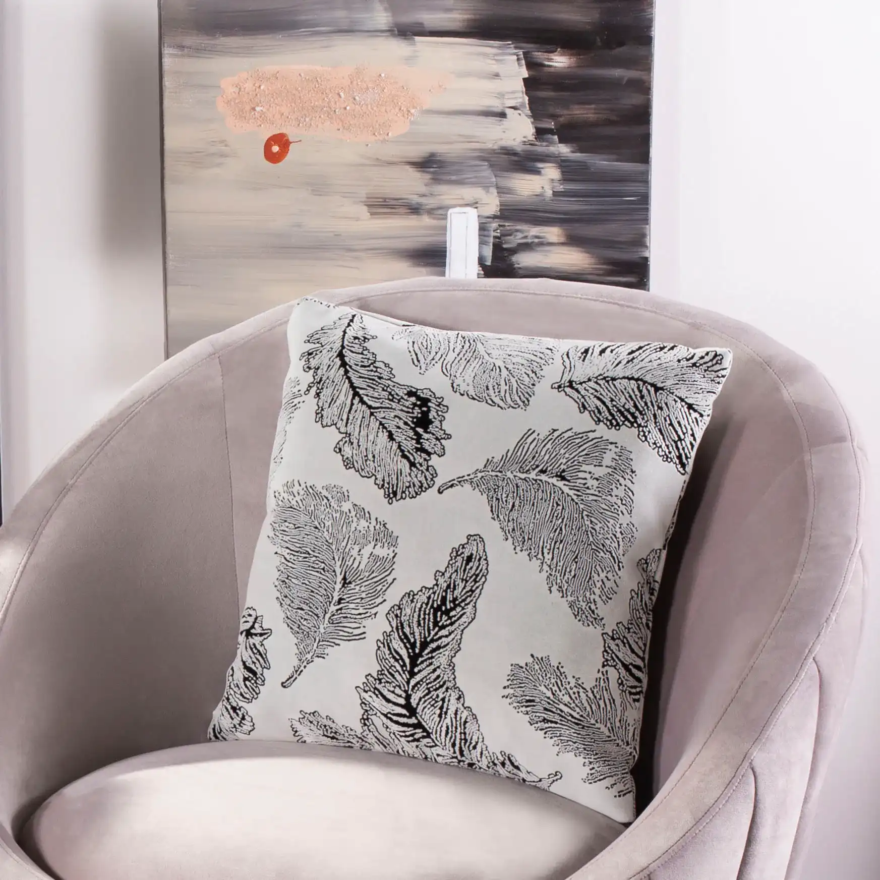 Livie Throw Pillow in Black / White in a styled room