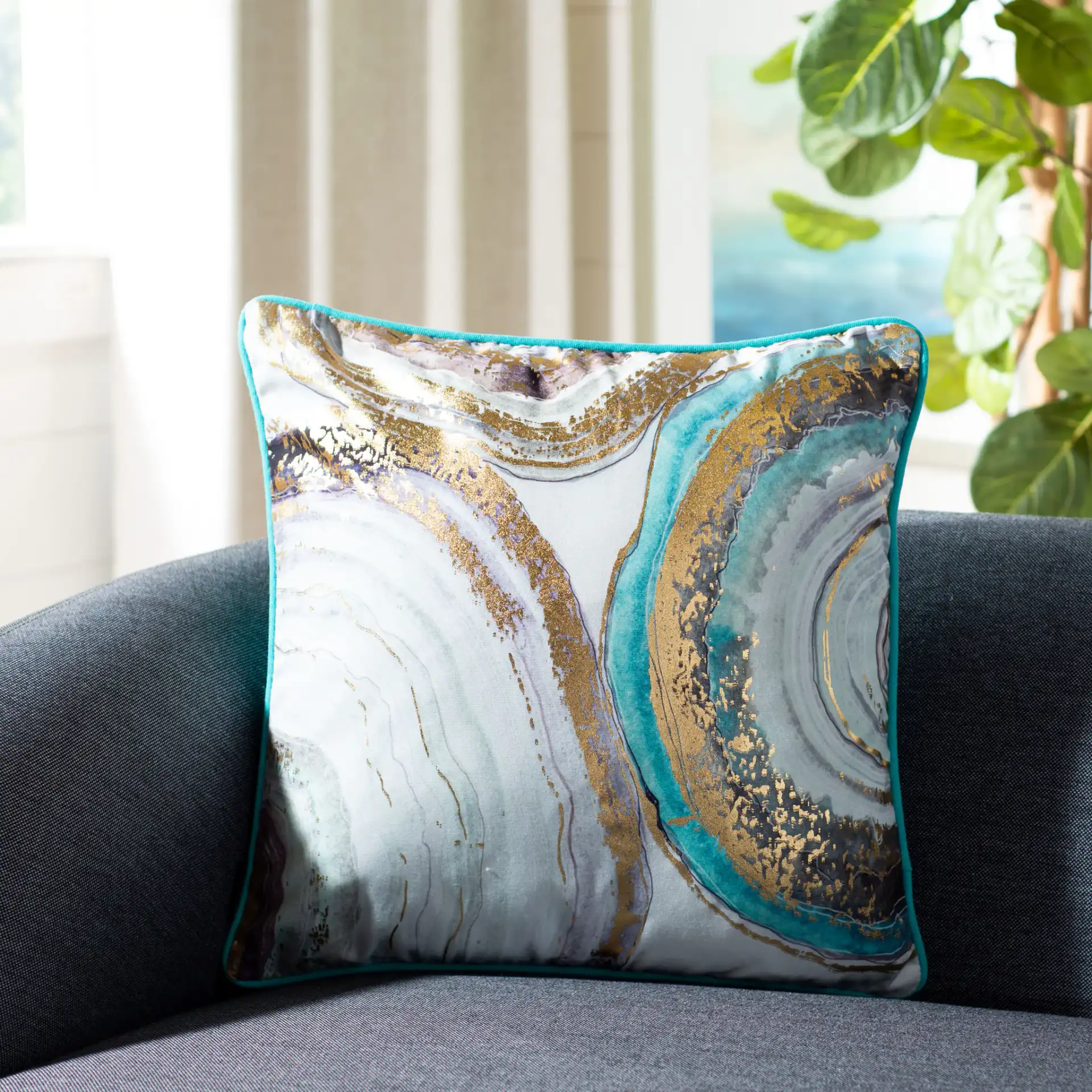 Nima Pillow in Blue / Gold in a styled room
