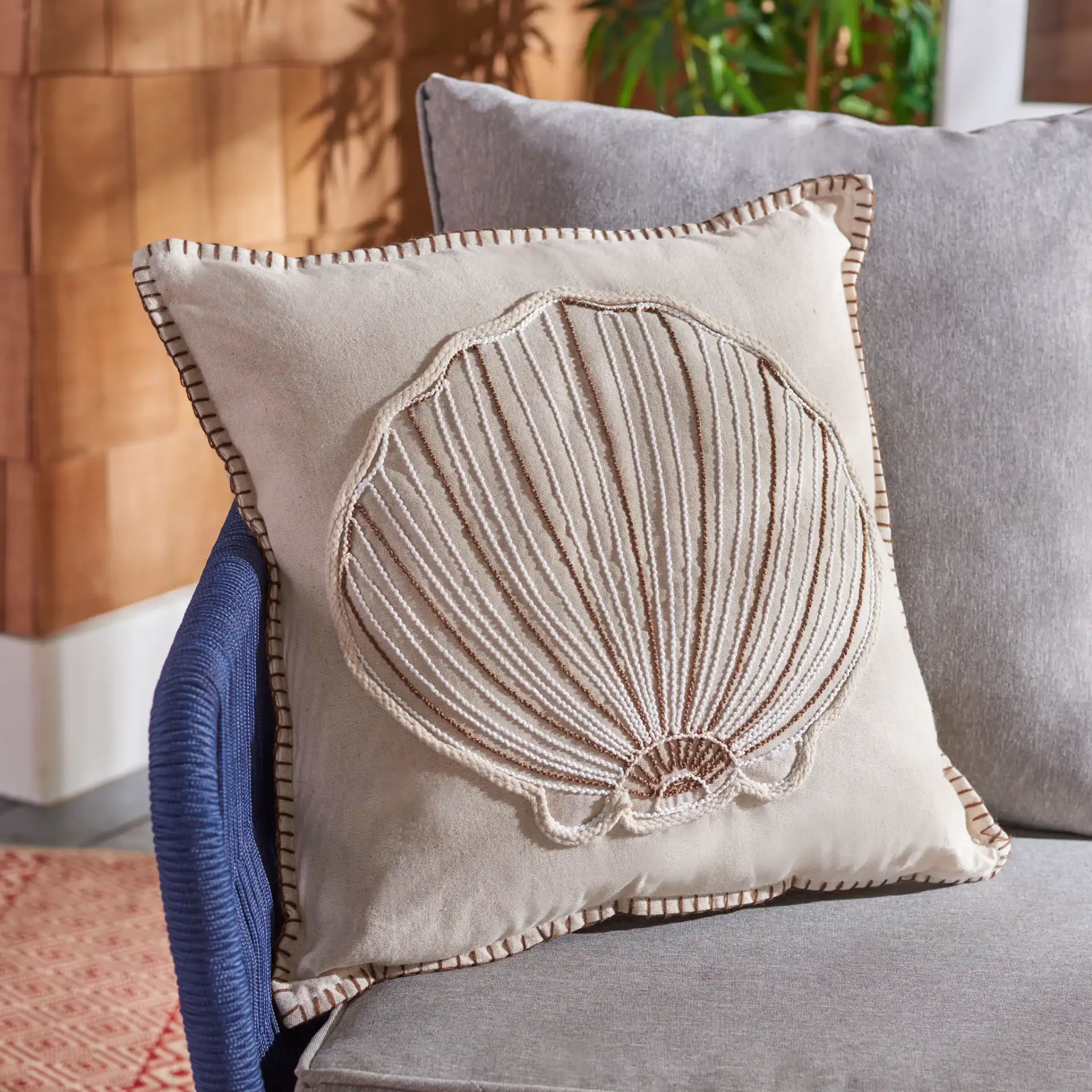 Della Starfish Pillow in Natural in a styled room
