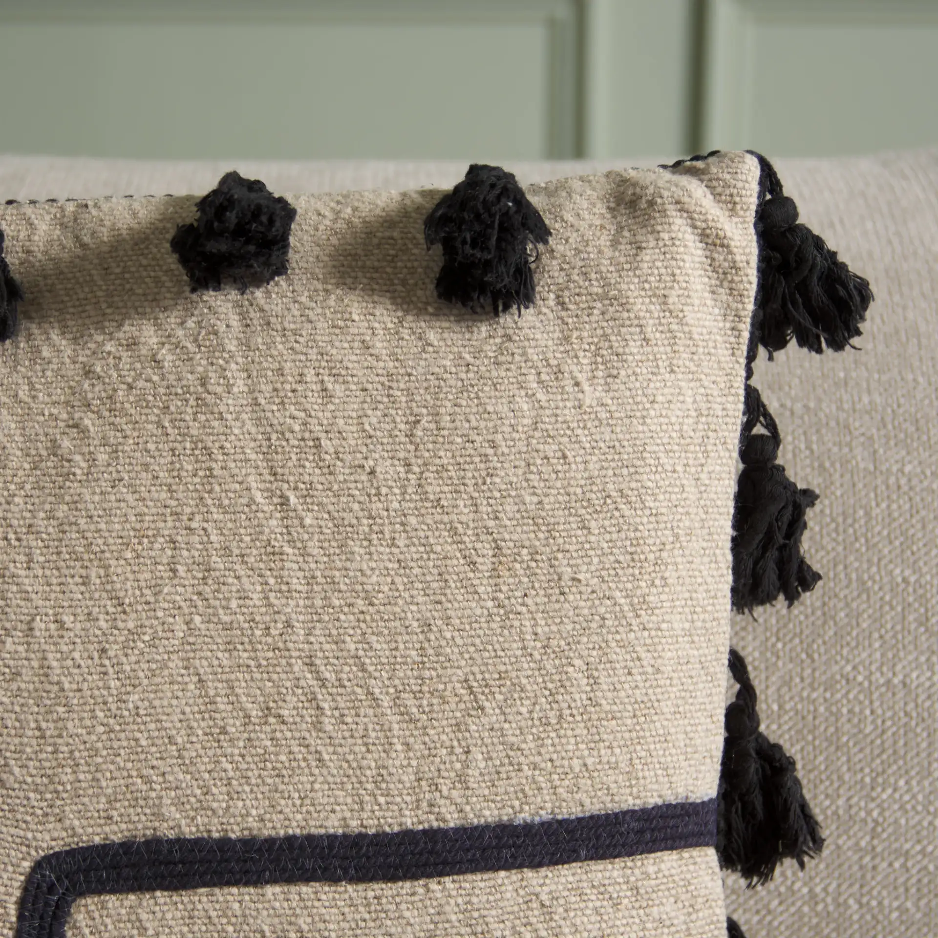 Nara 16 X 16 Pillow in Beige / Black in a styled room