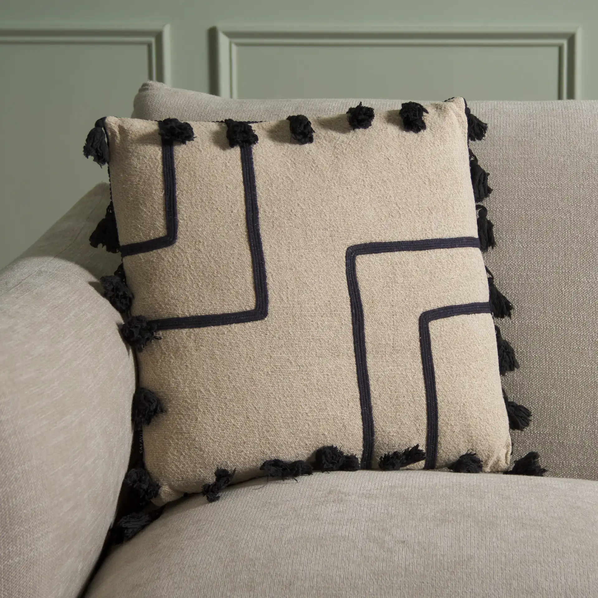 Nara 16 X 16 Pillow in Beige / Black in a styled room