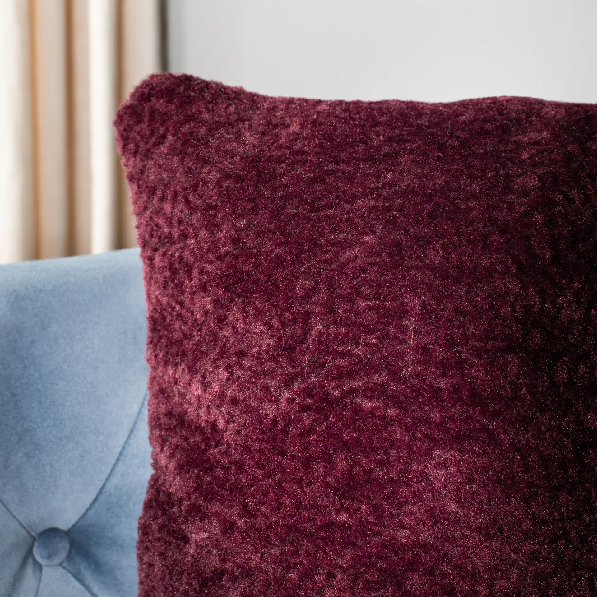 Barica Pillow in Dark Red in a styled room