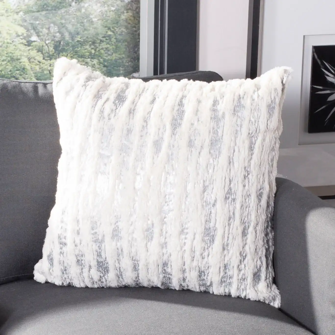 Lorelei Pillow in White / Silver in a styled room