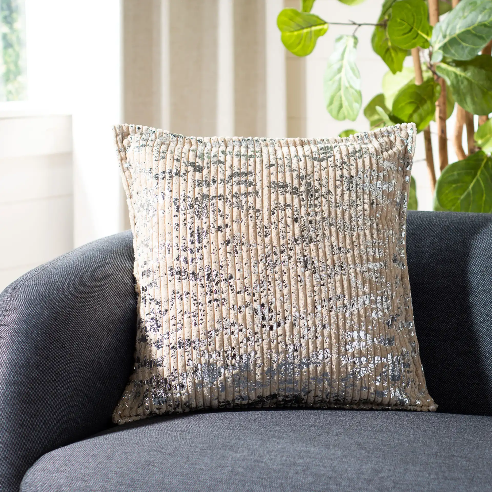 Elysia Pillow in Silver in a styled room