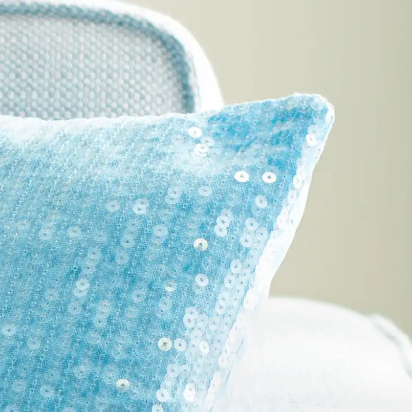 Gaila Pillow in Blue in a styled room
