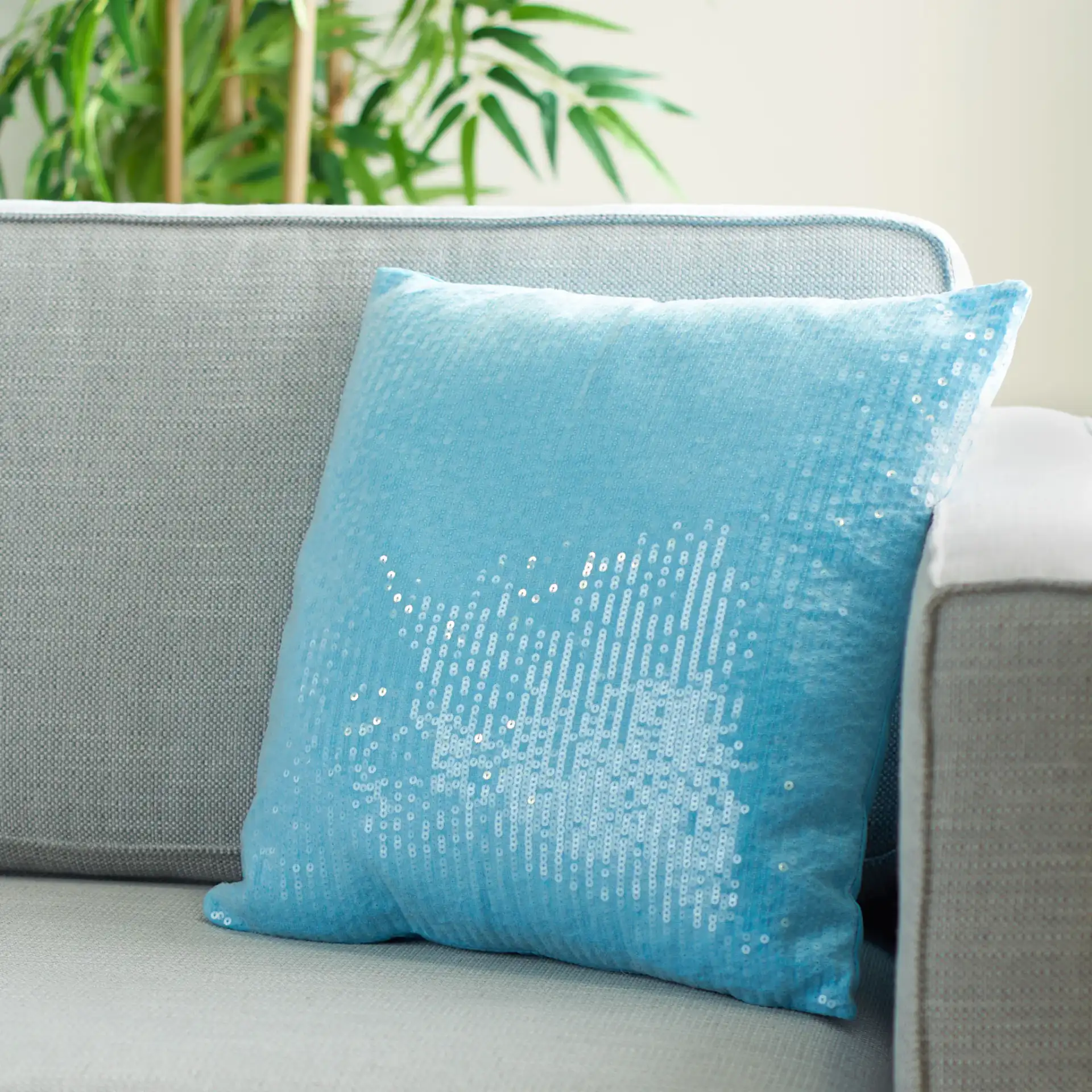 Gaila Pillow in Blue in a styled room