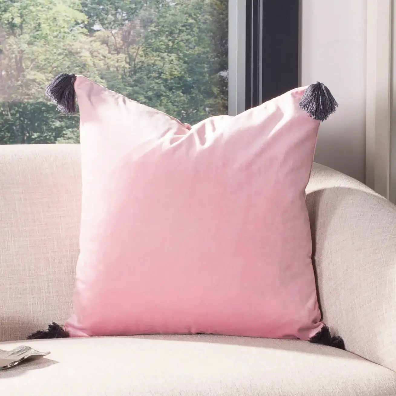 Adelina Throw Pillow in Pink in a styled room