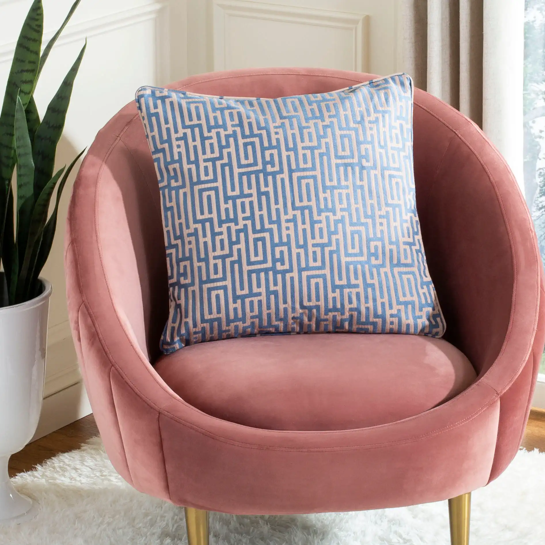 Basma Pillow in Blue / Tan in a styled room