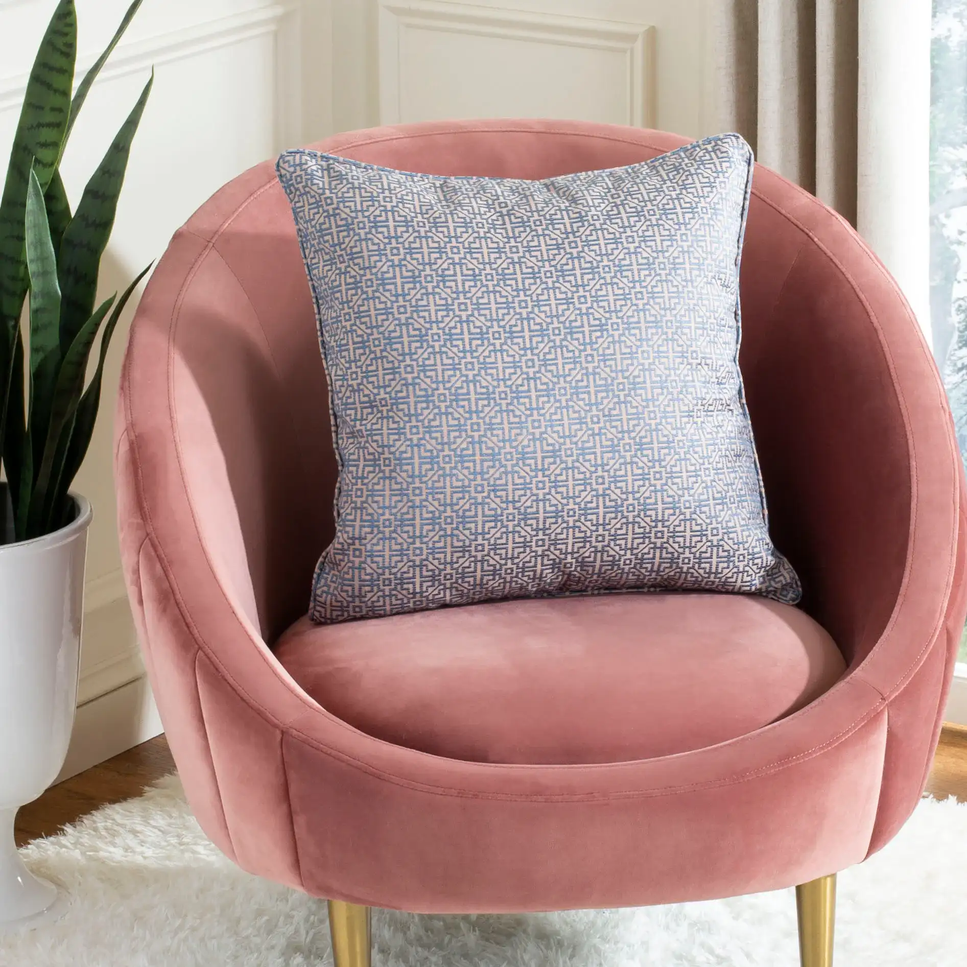 Caitria Pillow in Blue / Tan in a styled room