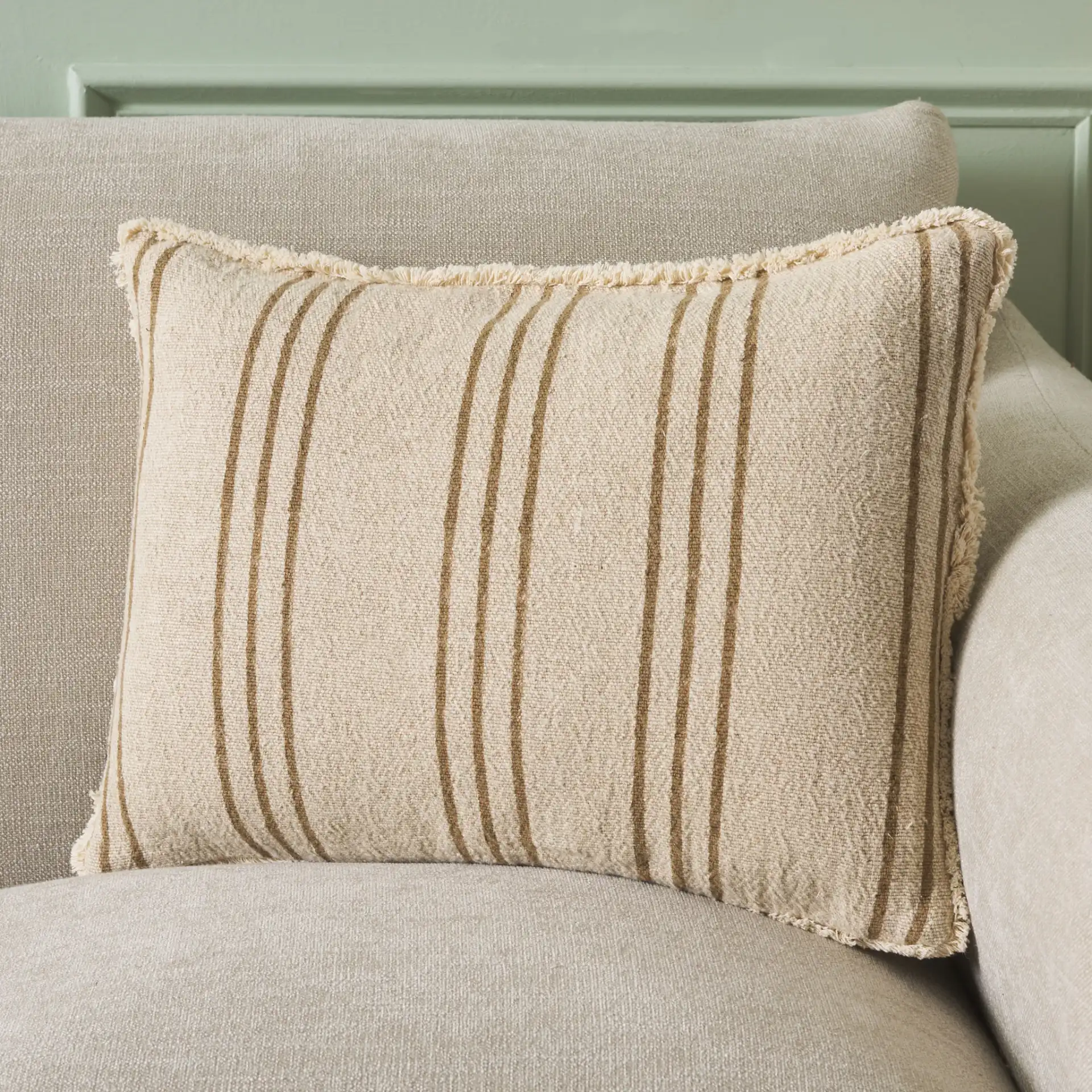 Rory Pillow in Tan / Natural in a styled room
