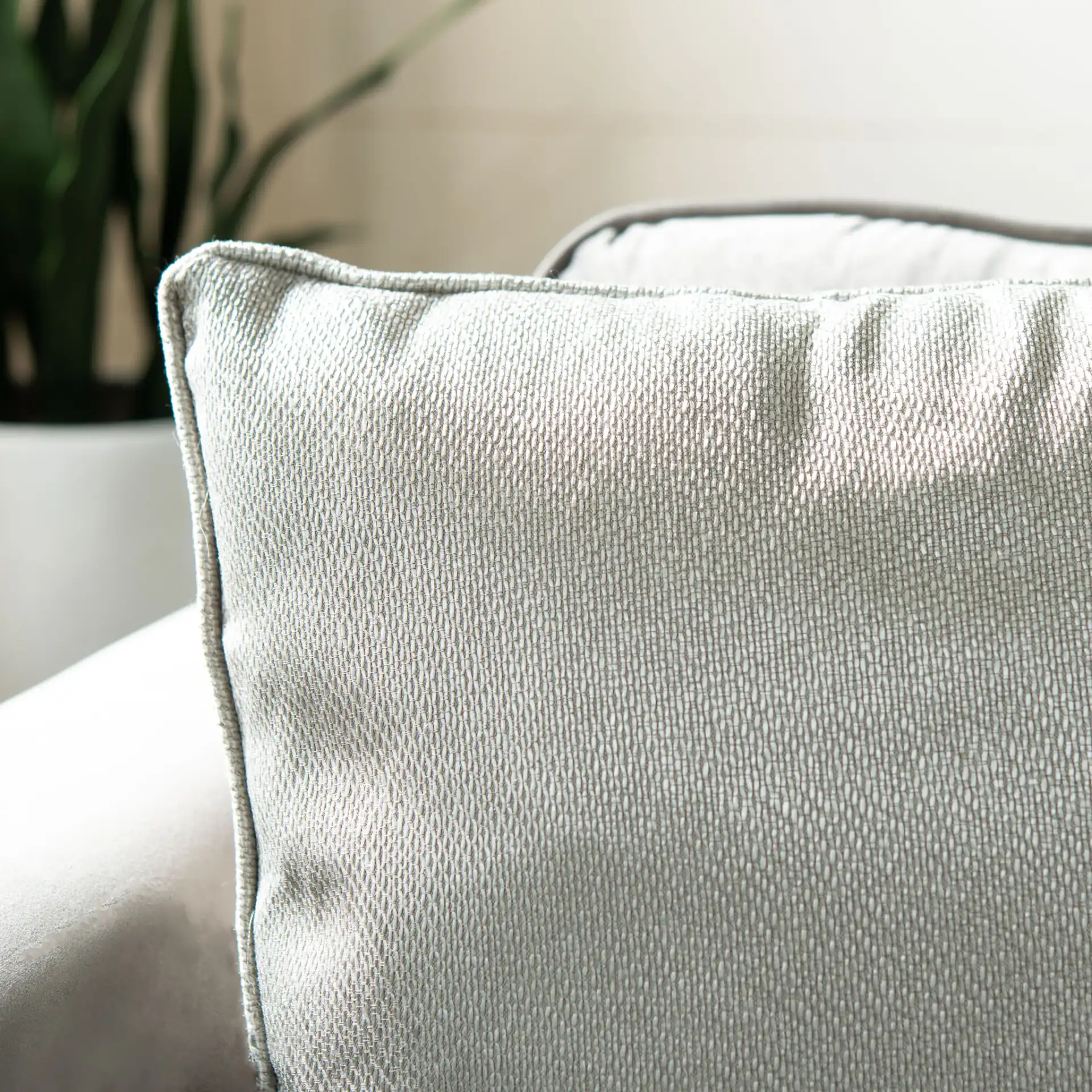 Raelyn Pillow in Light Gray in a styled room