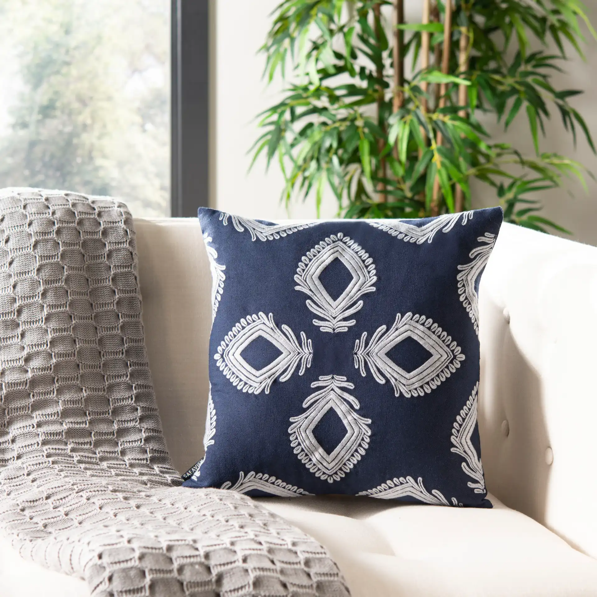Blossom Pillow in Navy / Periwinkle in a styled room