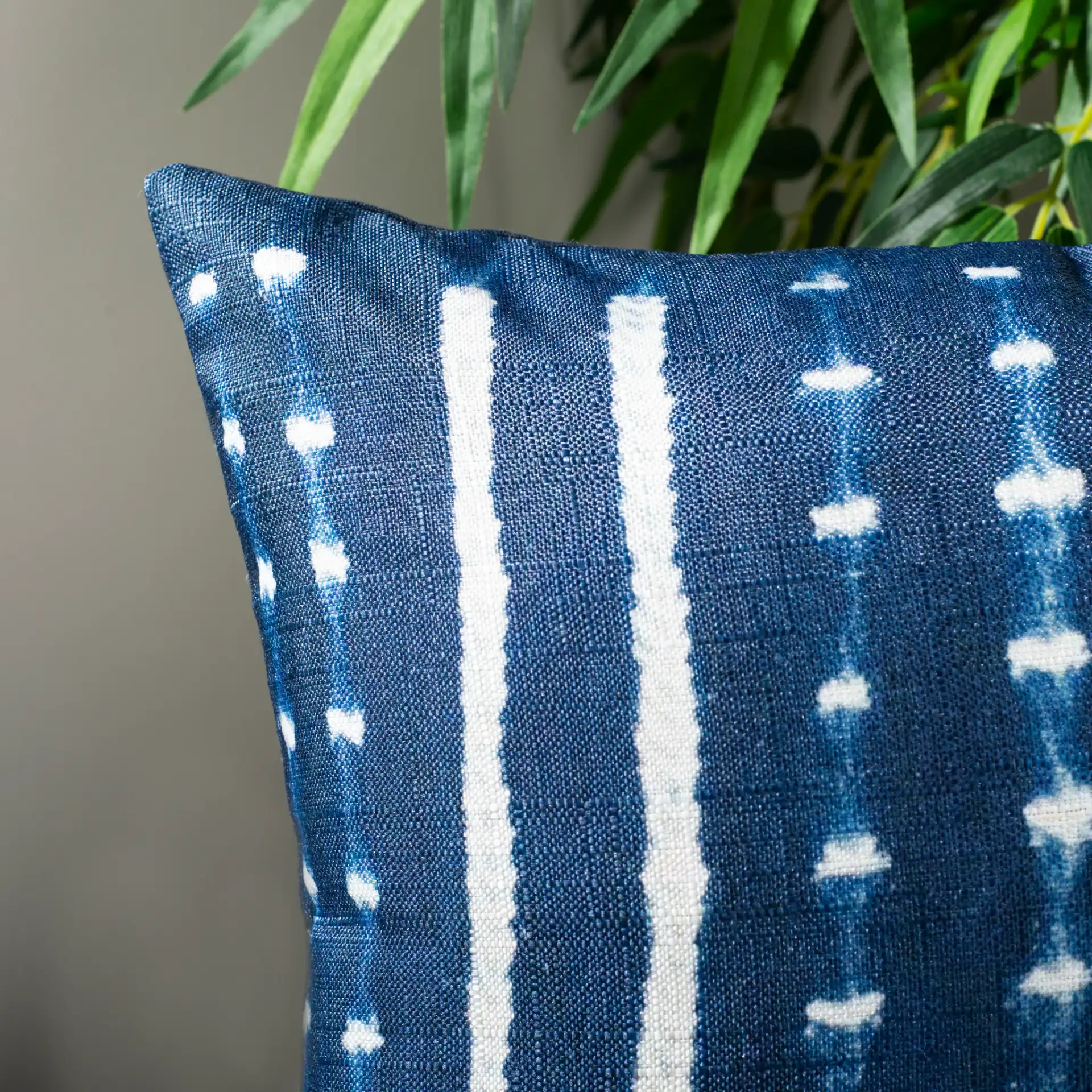 Narla Pillow in Deep Blue / White in a styled room