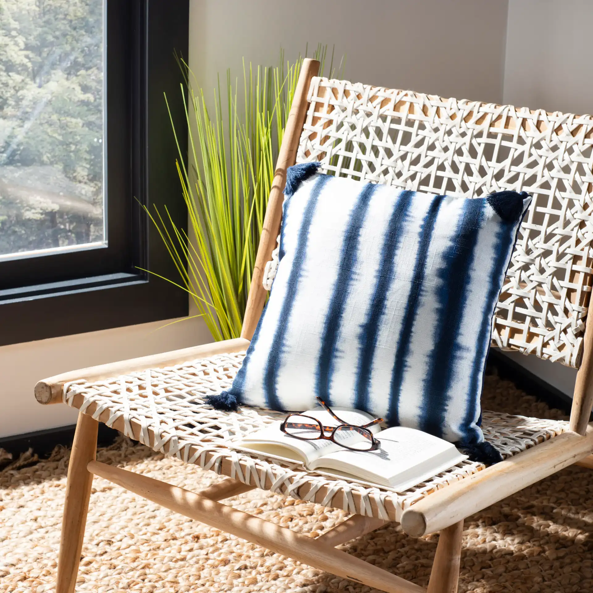 Cassia Pillow in Navy / White in a styled room