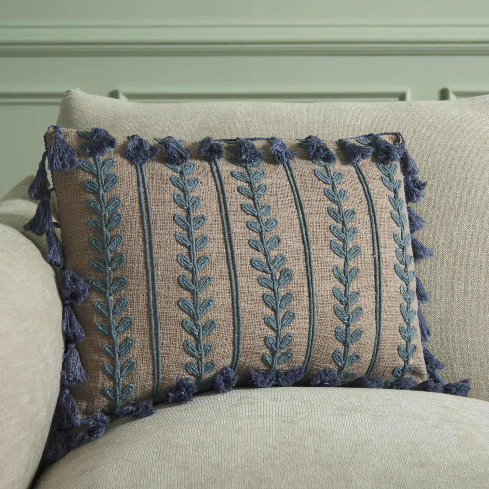 Ry Pillow in Gray / Blue in a styled room
